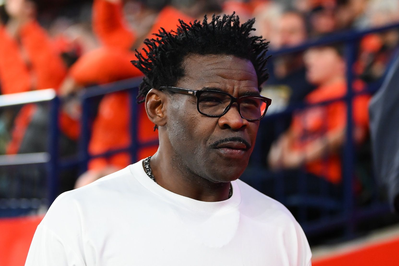 Miami Hurricanes former player and NFL Hall of Fame member Michael Irvin looks on during the first half of a game between the Miami Hurricanes and the Syracuse Orange at the JMA Wireless Dome.