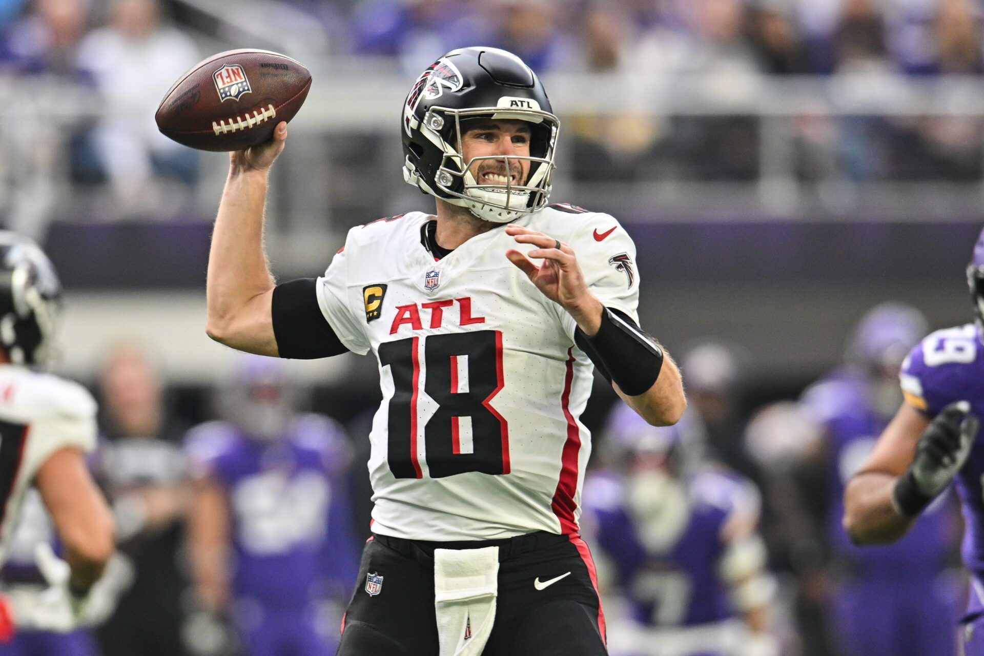 Atlanta Falcons quarterback Kirk Cousins (18) throws a pass against the Minnesota Vikings during the second quarter at U.S. Bank Stadium.