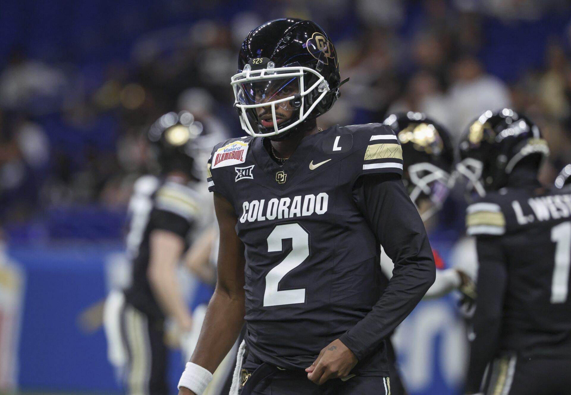 Colorado Buffaloes quarterback Shedeur Sanders (2) warms up before the game against the Brigham Young Cougars at Alamodome.