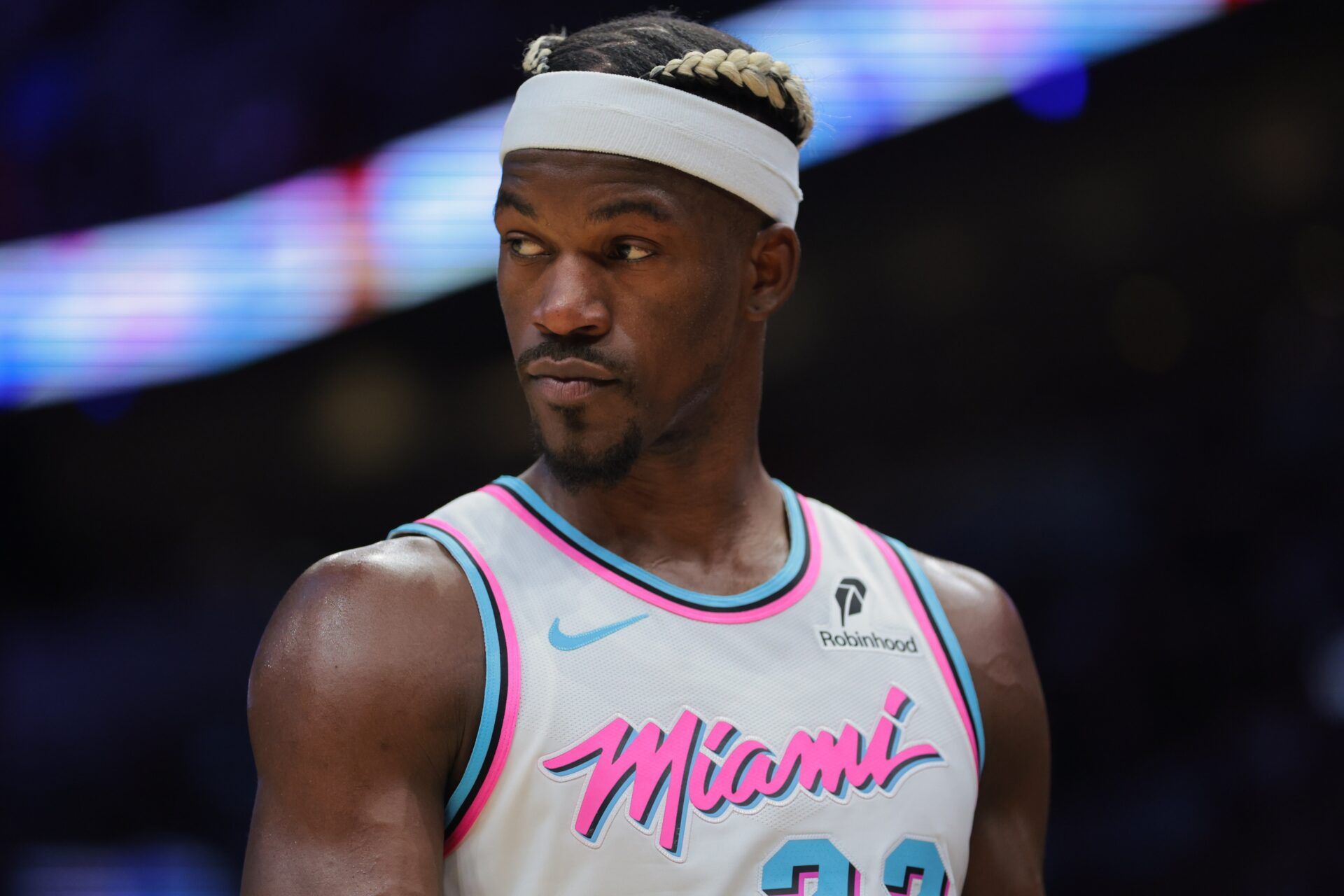 Miami Heat forward Jimmy Butler (22) looks on against the Denver Nuggets during the third quarter at Kaseya Center.