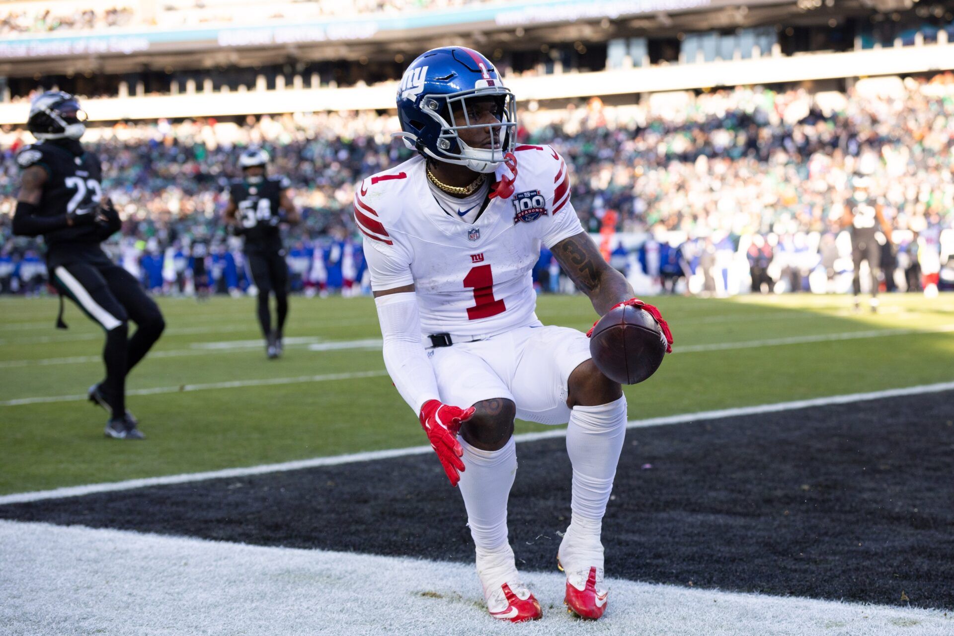 New York Giants wide receiver Malik Nabers (1) scores a touchdown against the Philadelphia Eagles during the fourth quarter at Lincoln Financial Field.