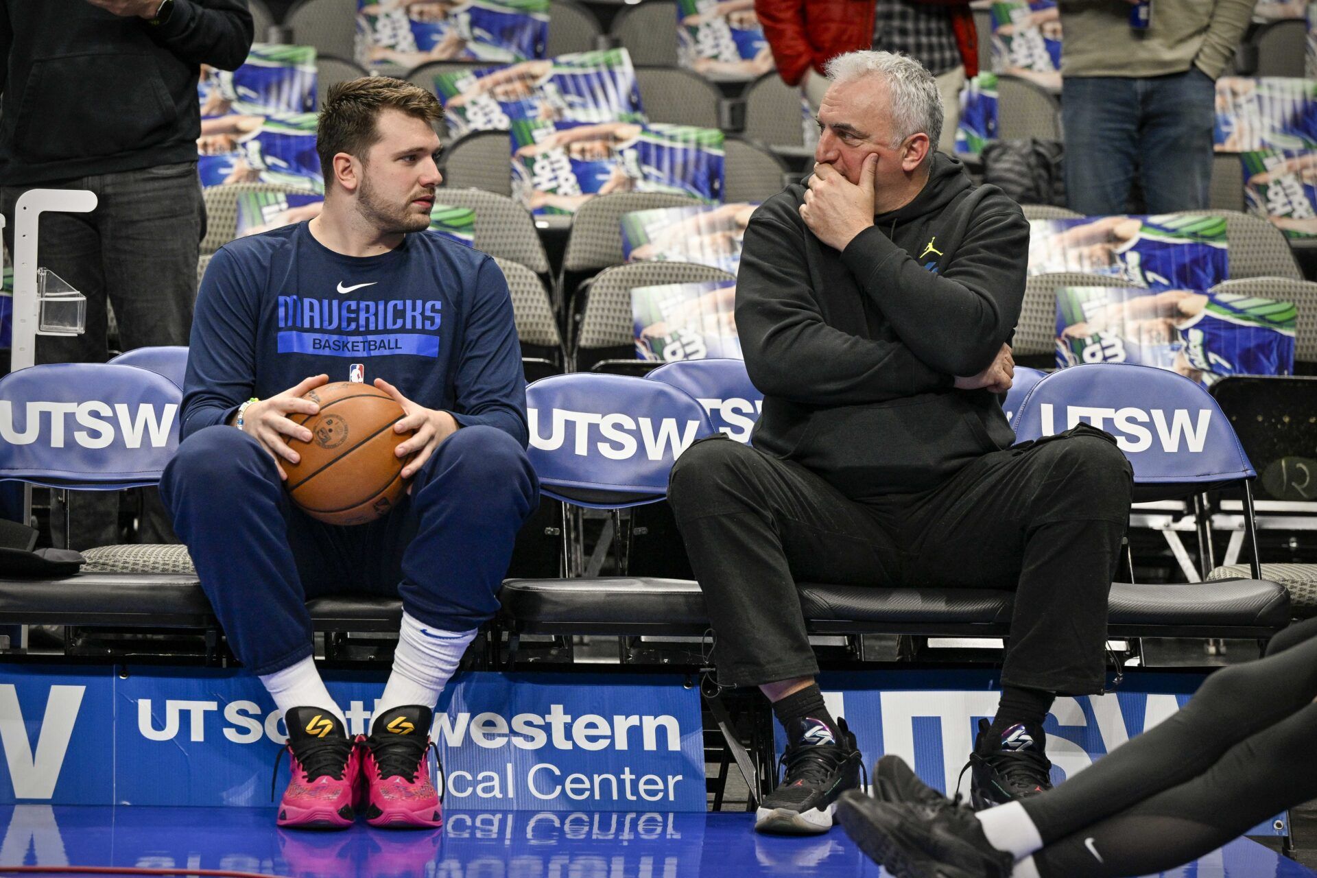 Dallas Mavericks guard Luka Doncic (left) talks with his father Sasa Doncic (right) before the game between the Dallas Mavericks and the Washington Wizards at the American Airlines Center.