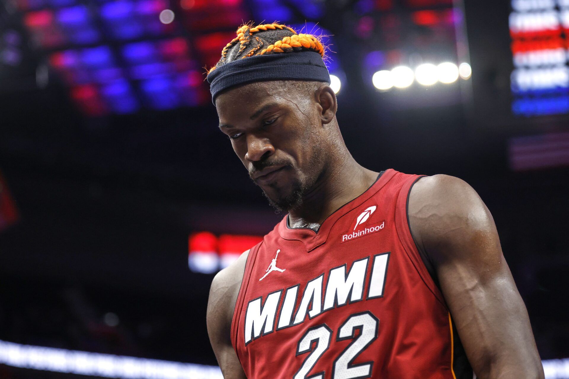 Miami Heat forward Jimmy Butler (22) walks off the court after the game against the Detroit Pistons at Little Caesars Arena.