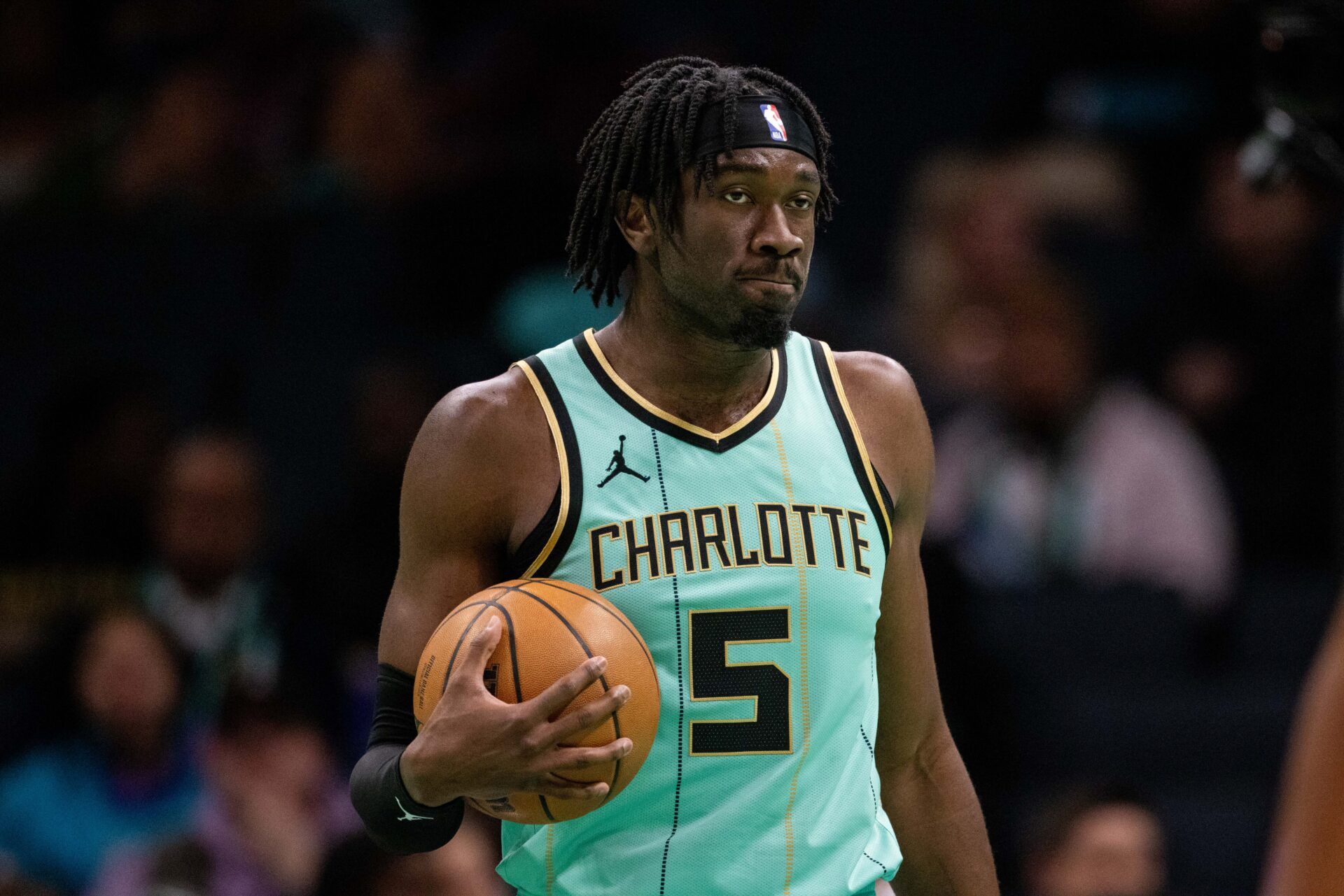 Jan 24, 2025; Charlotte, North Carolina, USA; Charlotte Hornets center Mark Williams (5) holds the ball against the Portland Trail Blazers during the second quarter at Spectrum Center. Mandatory Credit: Scott Kinser-Imagn Images