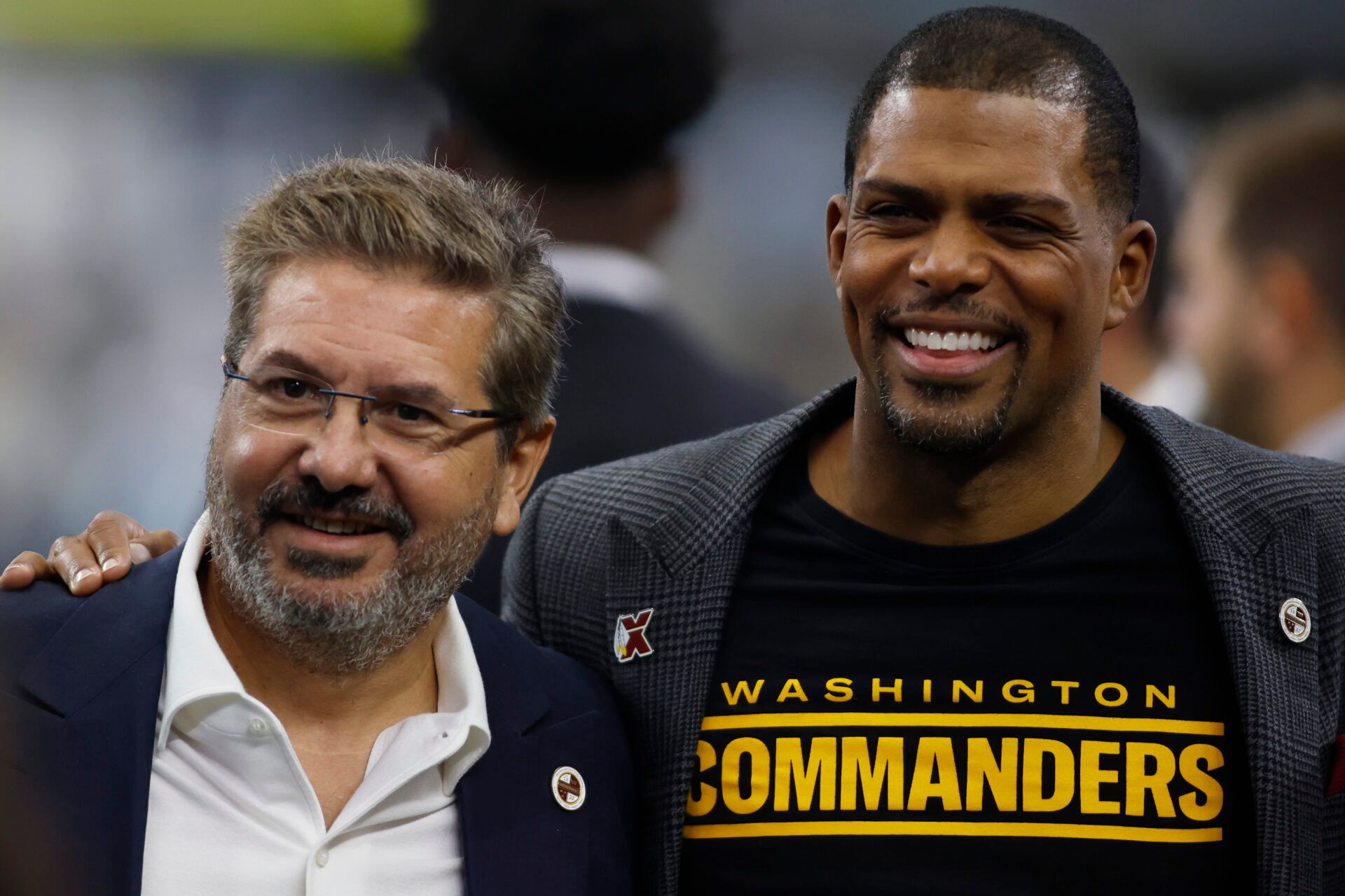 Oct 2, 2022; Arlington, Texas, USA; Washington Commanders owner Dan Snyder (L) and president Jason Wright (R) pose for a photo before the game against the Dallas Cowboys at AT&T Stadium. Mandatory Credit: Tim Heitman-USA TODAY Sports