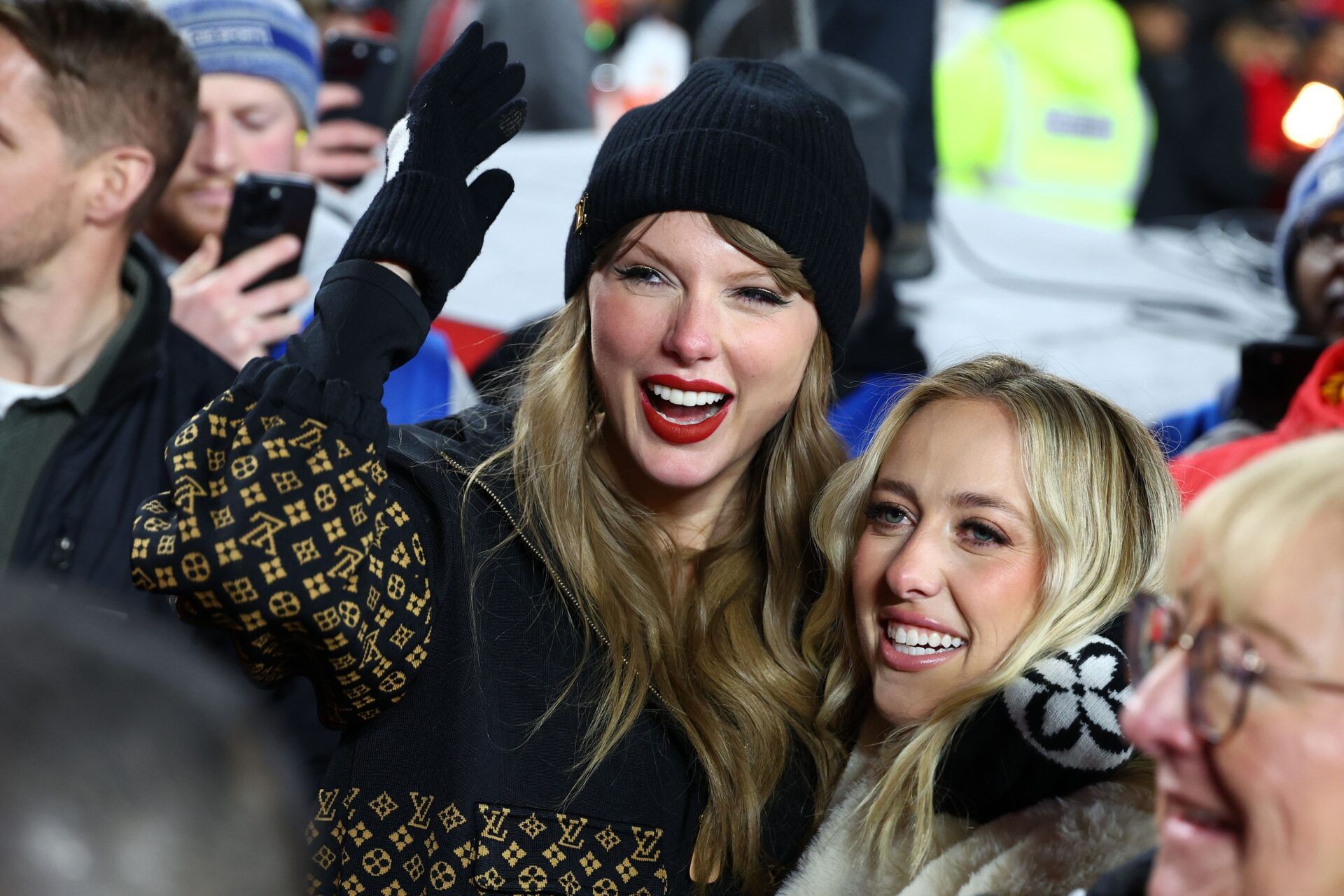 Recording artist Taylor Swift and Brittany Mahomes react after the AFC Championship game against the Buffalo Bills at GEHA Field at Arrowhead Stadium.