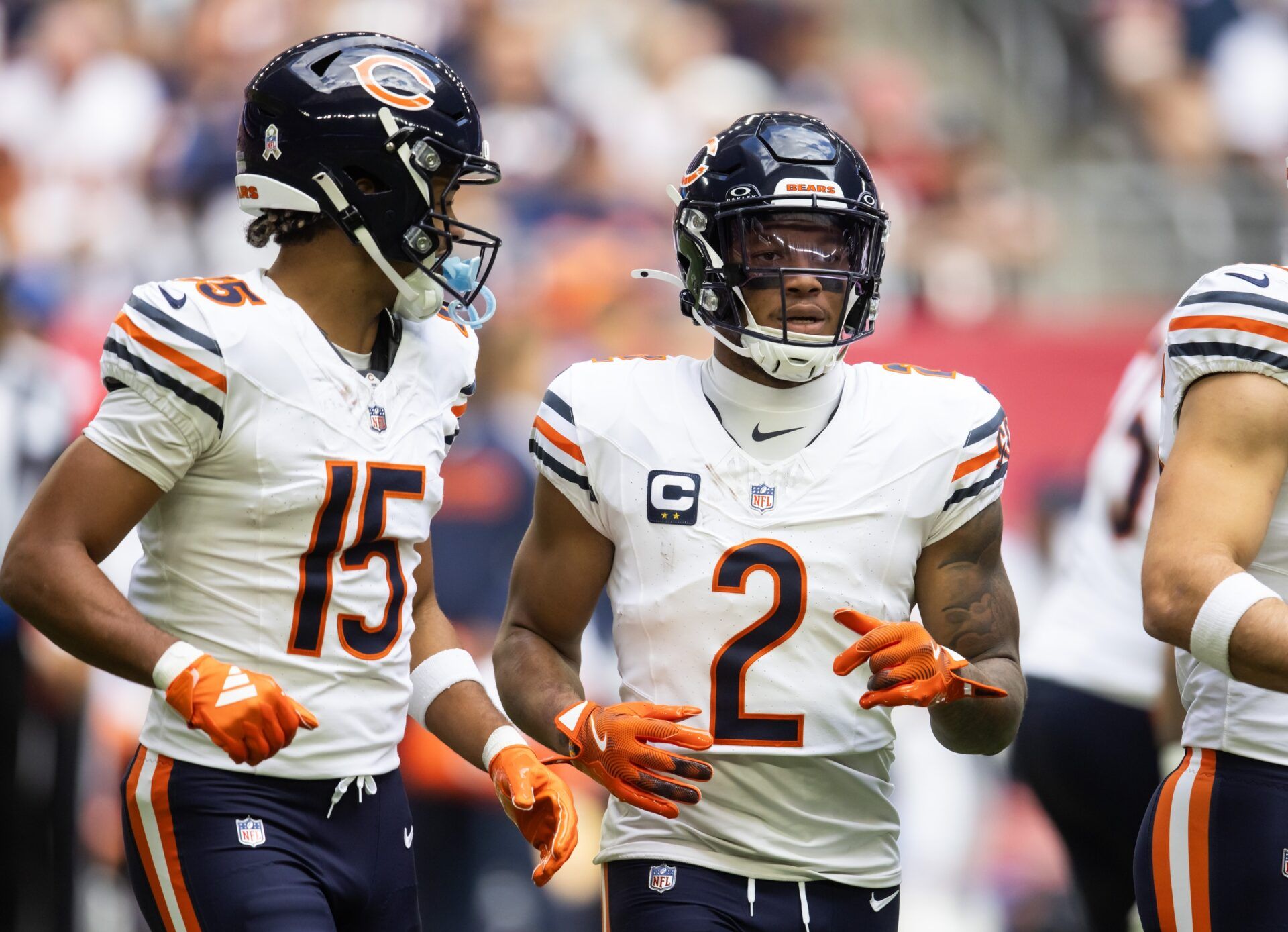 Chicago Bears wide receiver DJ Moore (2) and Rome Odunze (15) against the Arizona Cardinals at State Farm Stadium.