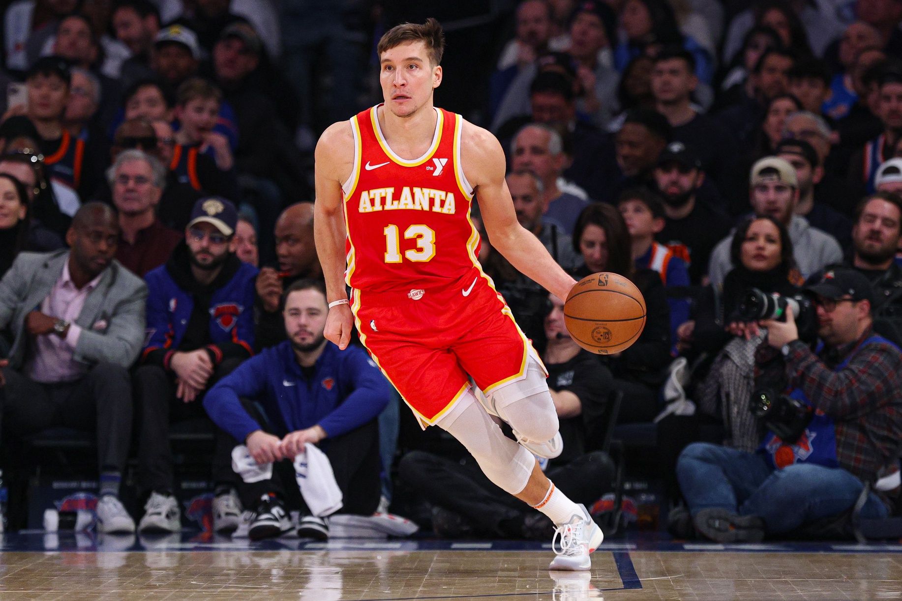 Atlanta Hawks guard Bogdan Bogdanovic (13) dribbles up court during the first half against the New York Knicks at Madison Square Garden.