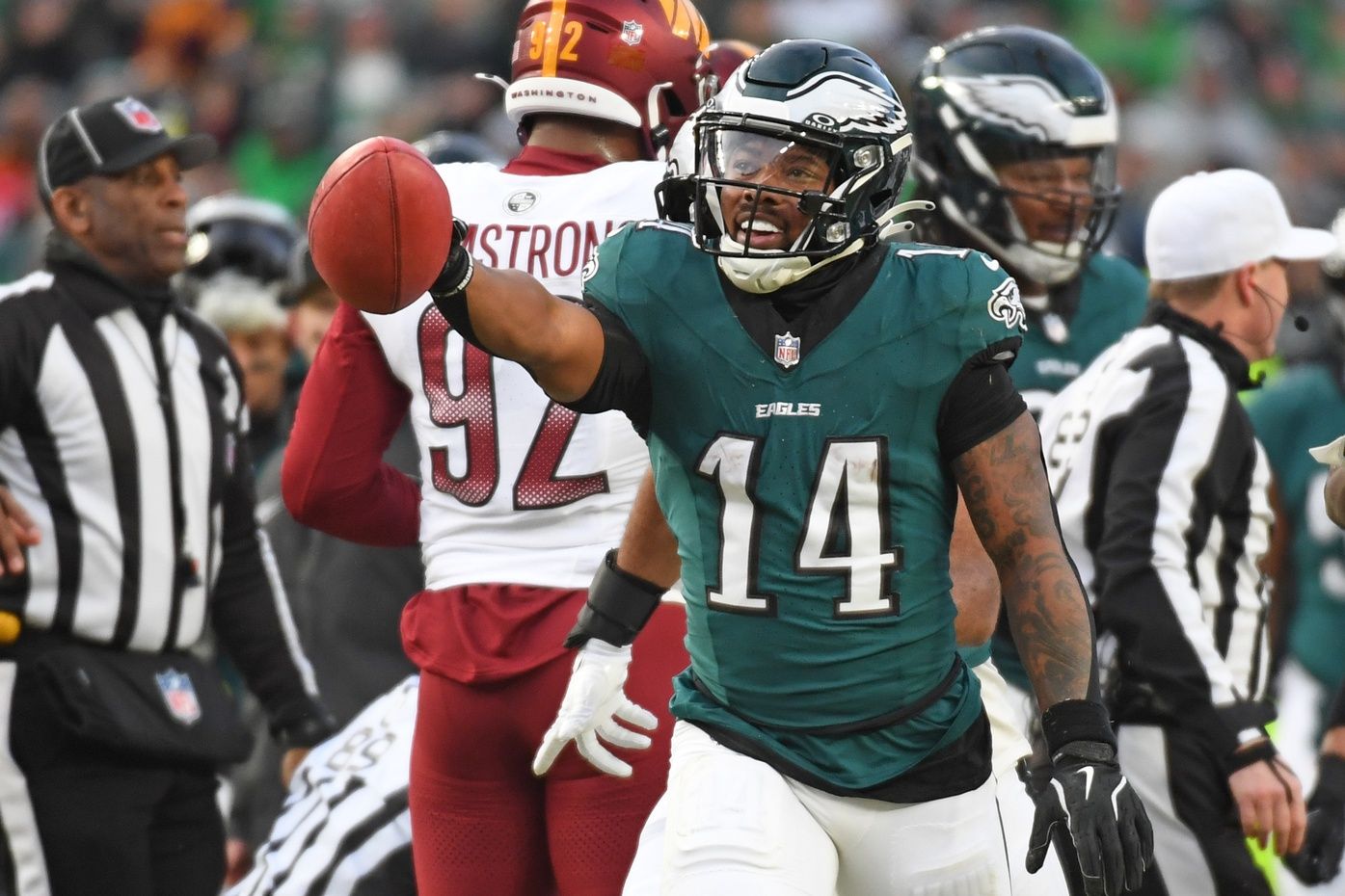 Philadelphia Eagles running back Kenneth Gainwell (14) celebrates after recovering a fumble against the Washington Commanders in the NFC Championship game at Lincoln Financial Field.