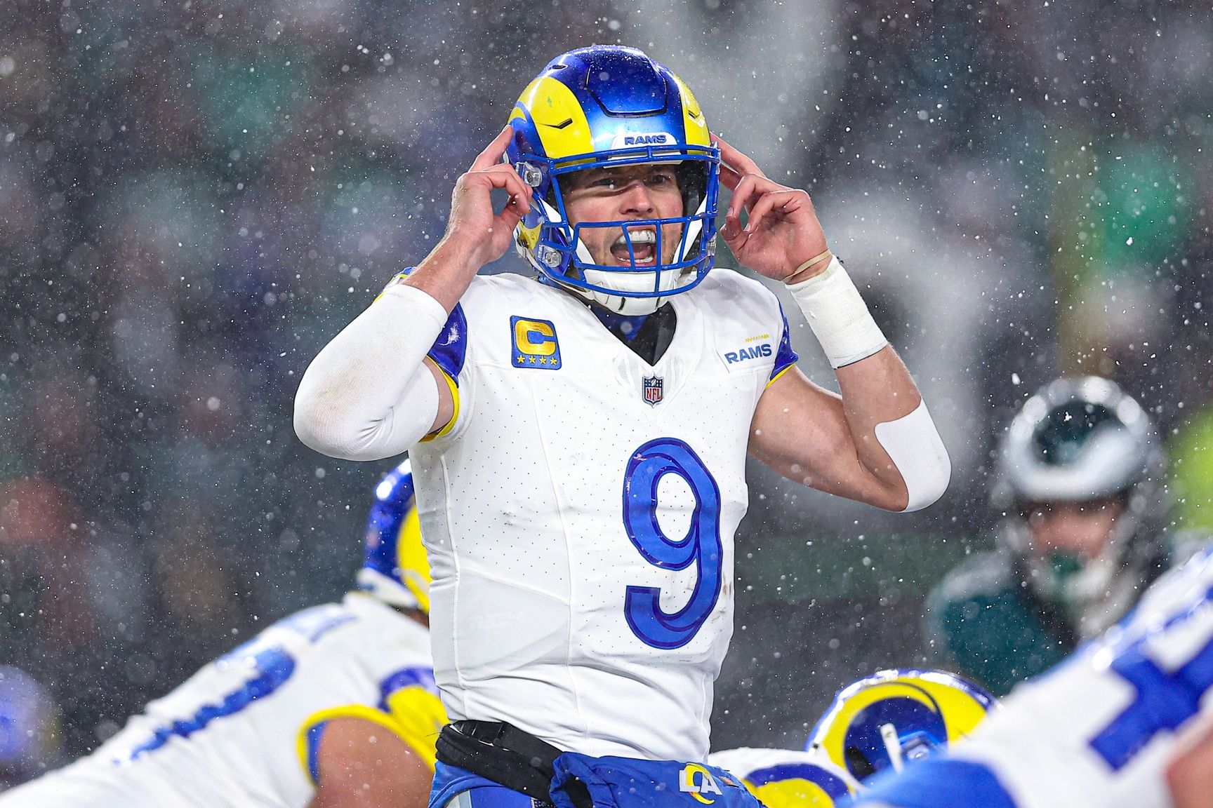 Los Angeles Rams quarterback Matthew Stafford (9) calls a play at the one of scrimmage against the Philadelphia Eagles in a 2025 NFC divisional round game at Lincoln Financial Field.