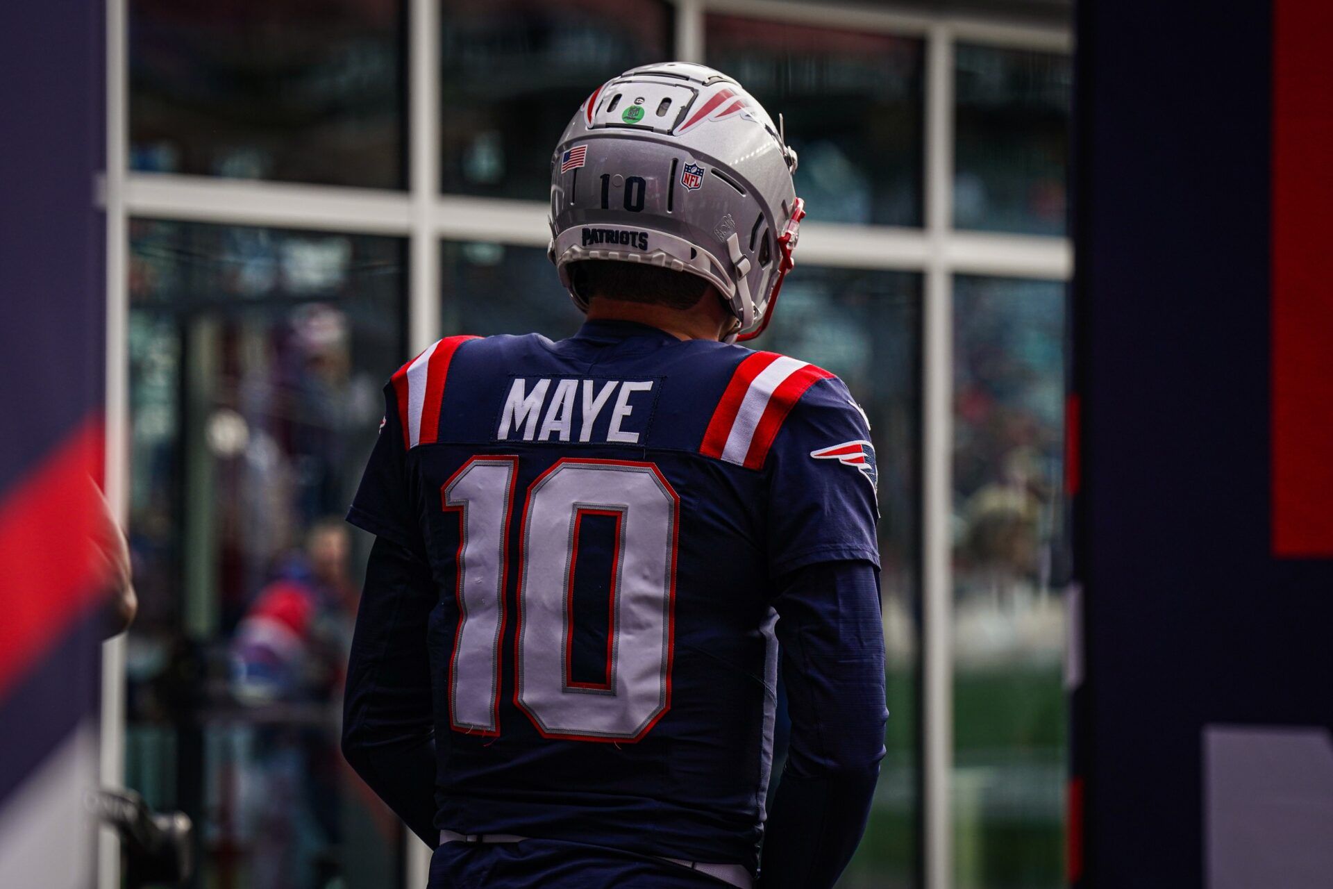 New England Patriots quarterback Drake Maye (10) walks to the field to warm up before the start of the game against the Buffalo Bills at Gillette Stadium.