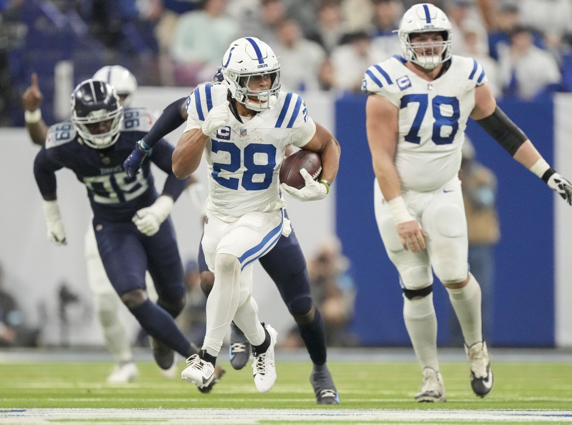 Indianapolis Colts running back Jonathan Taylor (28) rushes for a touchdown during a game against the Tennessee Titans at Lucas Oil Stadium.