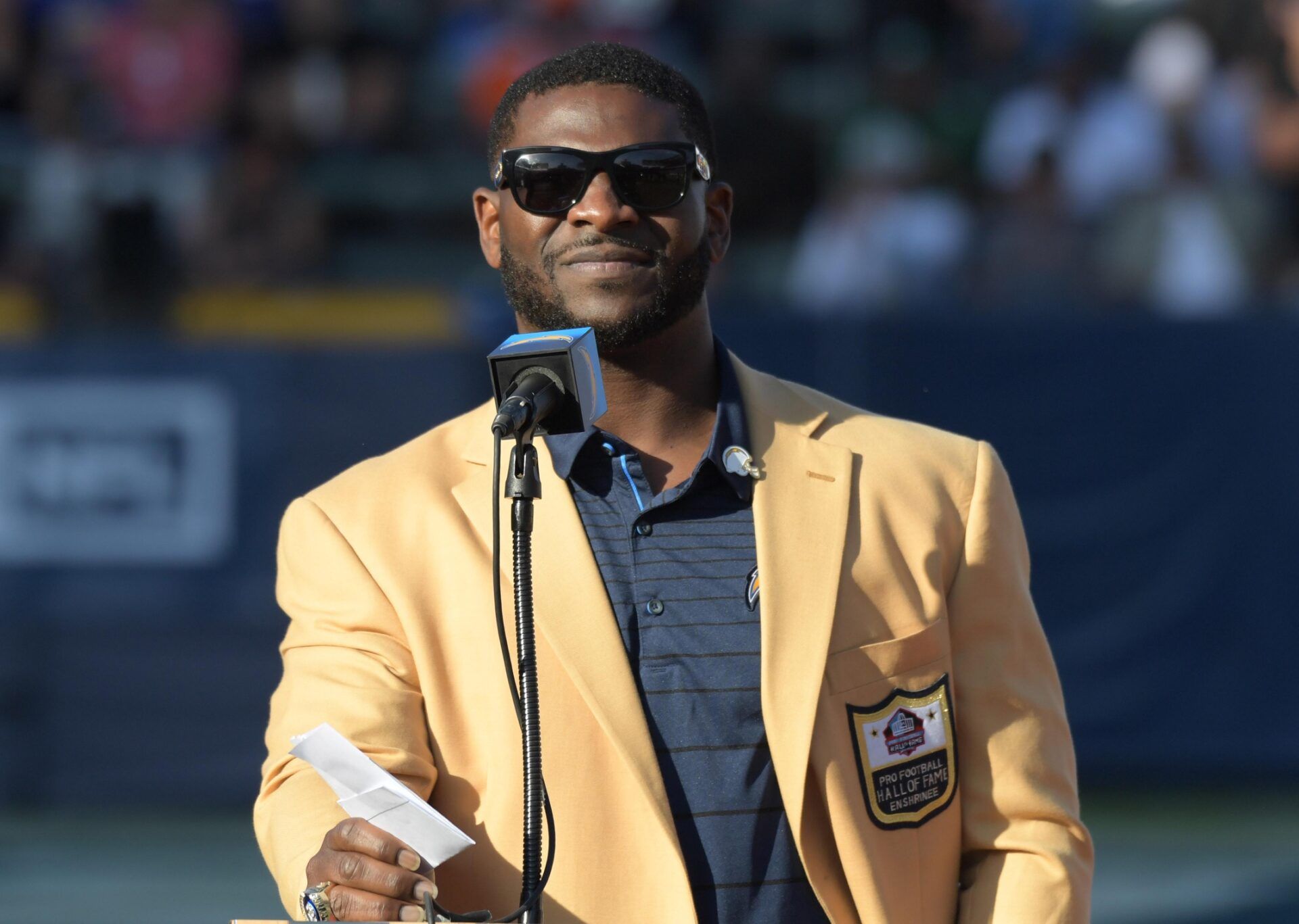 San Diego Chargers former running back LaDainian Tomlinson emcees a Pro Football Hall of Fame ring of excellence ceremony during an NFL football game between the Cleveland Browns and the Los Angeles Chargers at StubHub Center.