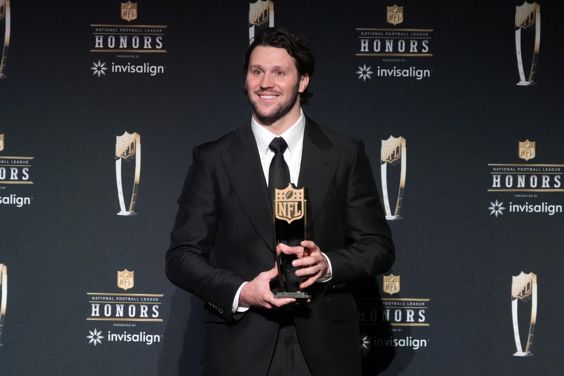 Buffalo Bills quarterback Josh Allen poses wtih the Most Valuable Player award during Super Bowl LIX NFL Honors at Saenger Theatre.