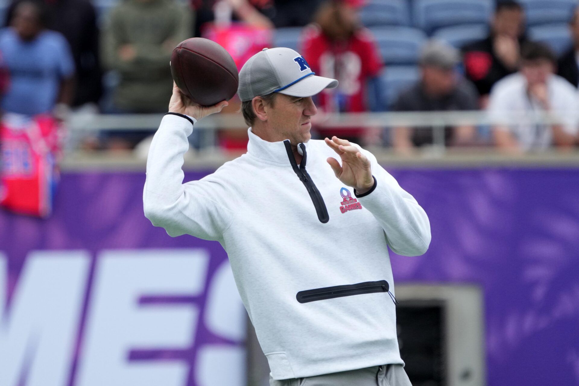 NFC coach Eli Manning throws the ball during Pro Bowl Games practice at Camping World Stadium.