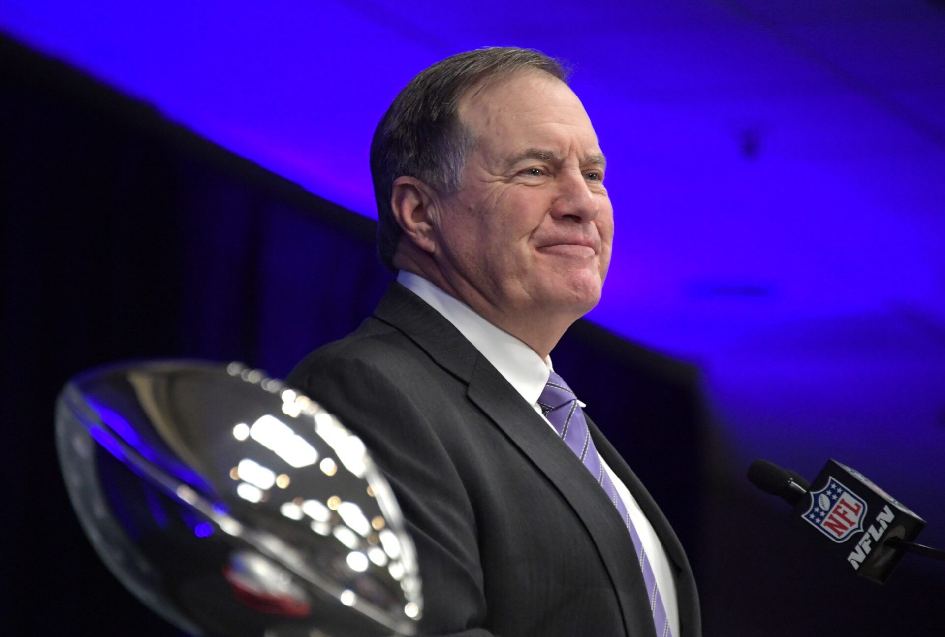 New England Patriots coach Bill Belichick speaks flanked by the Vince Lombardi trophy during Super Bowl LIII winning team press conference at Georgia World Congress Center. The Patriots defeated the Los Angeles Rams 13-3 to win an NFL record-tying sixth championship.