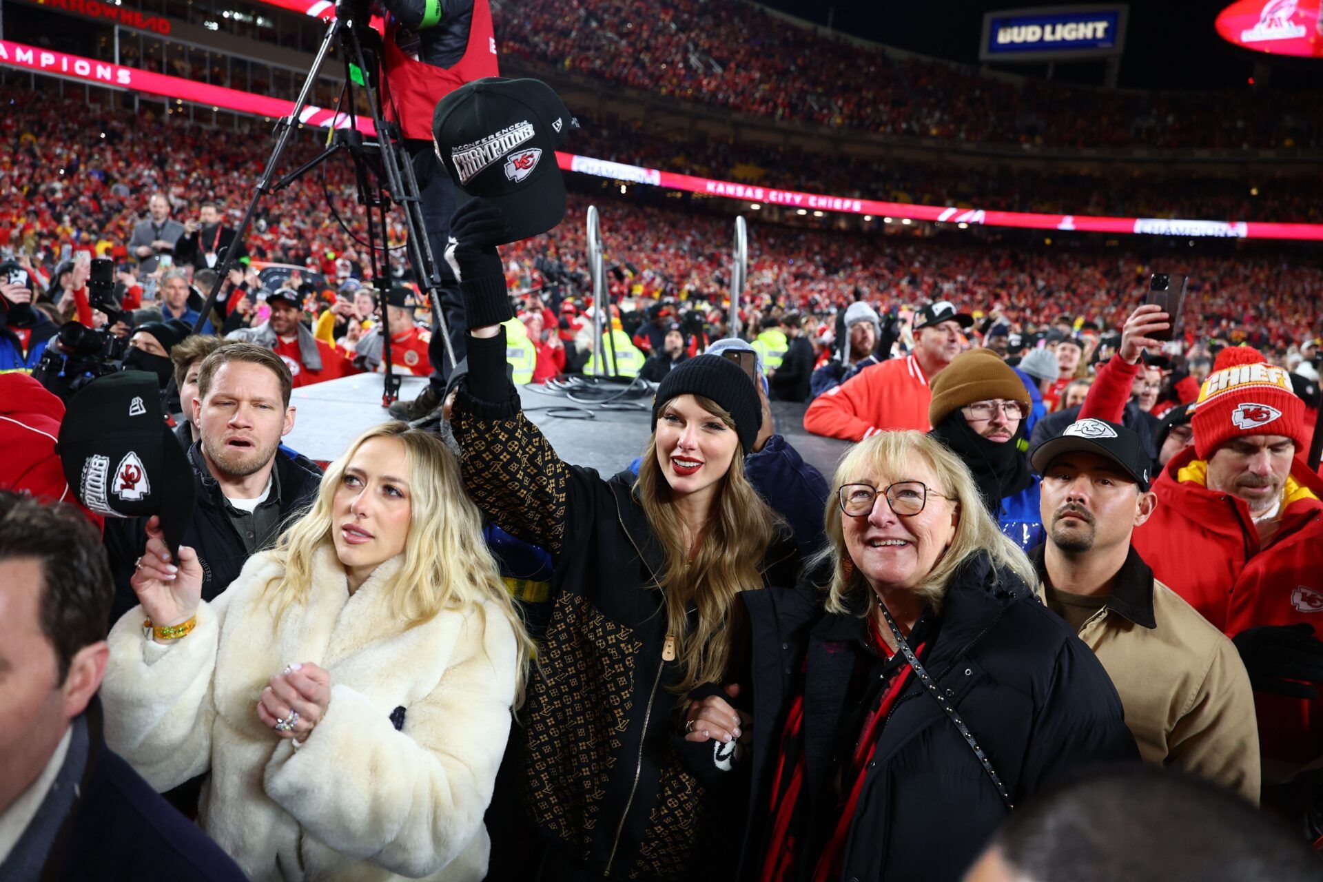 Recording artist Taylor Swift (center) Brittany Mahomes (left) and Donna Kelce (right) react after the AFC Championship game against the Buffalo Bills at GEHA Field at Arrowhead Stadium.