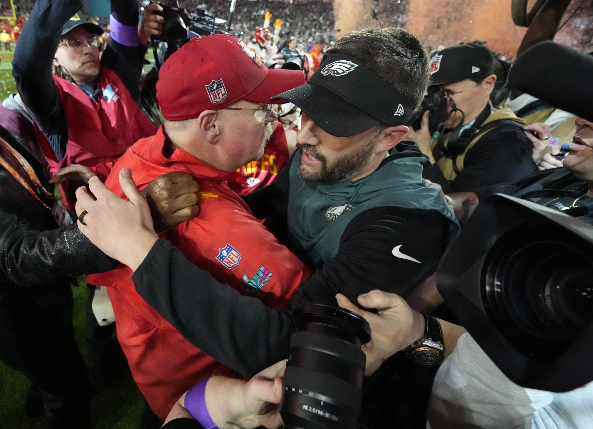 Kansas City Chiefs head coach Andy Reid and Philadelphia Eagles head coach Nick Sirianni greet each other after Super Bowl LVII at State Farm Stadium.