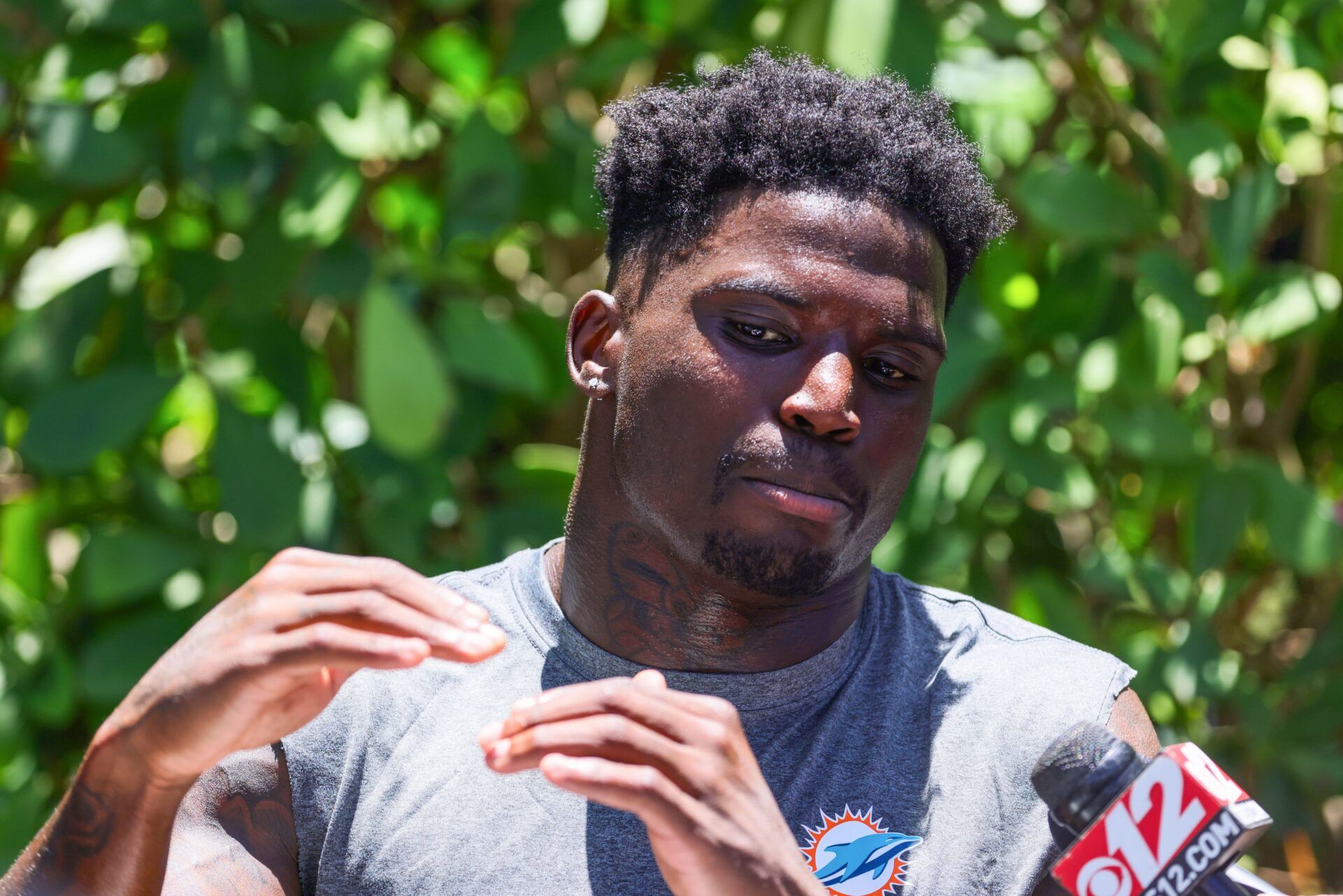 Miami Dolphins wide receiver Tyreek Hill (10) speaks to reporters during mandatory minicamp at Baptist Health Training Complex.