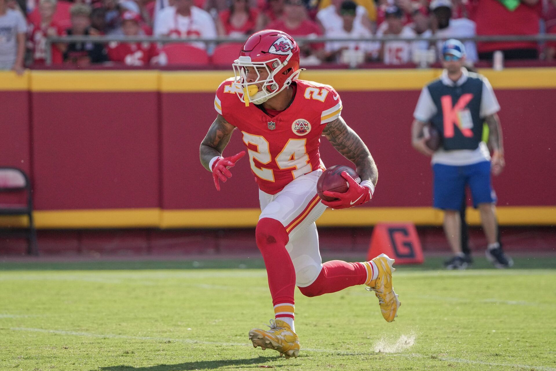 Kansas City Chiefs wide receiver Skyy Moore (24) runs the ball against the Detroit Lions during the game at GEHA Field at Arrowhead Stadium.