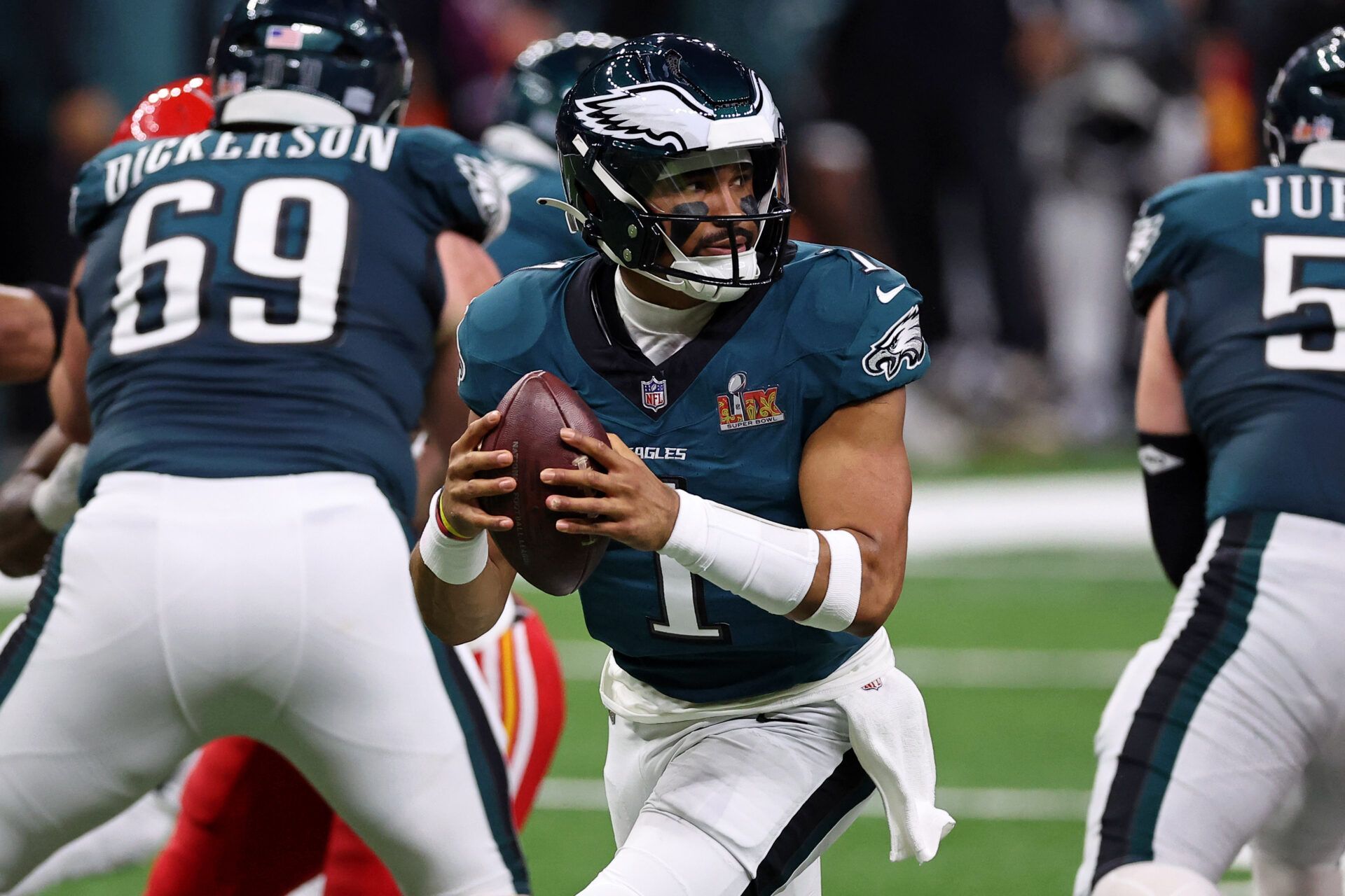 Feb 9, 2025; New Orleans, LA, USA; Philadelphia Eagles quarterback Jalen Hurts (1) looks to pass the ball against the Kansas City Chiefs during the first half of Super Bowl LIX at Caesars Superdome. Mandatory Credit: Bill Streicher-Imagn Images