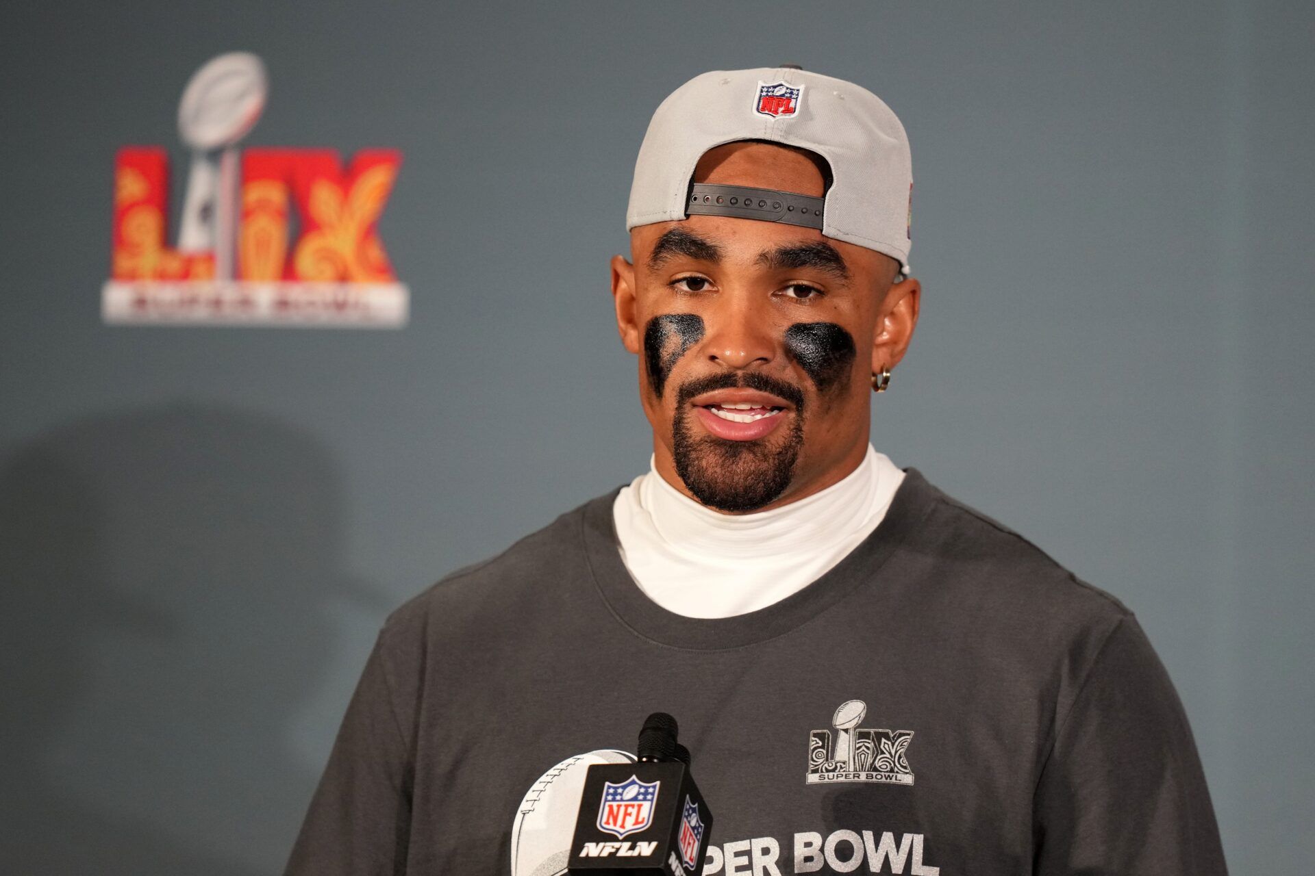 Philadelphia Eagles quarterback Jalen Hurts (1) speaks to the media after defeating the Kansas City Chiefs in Super Bowl LIX at Caesars Superdome.