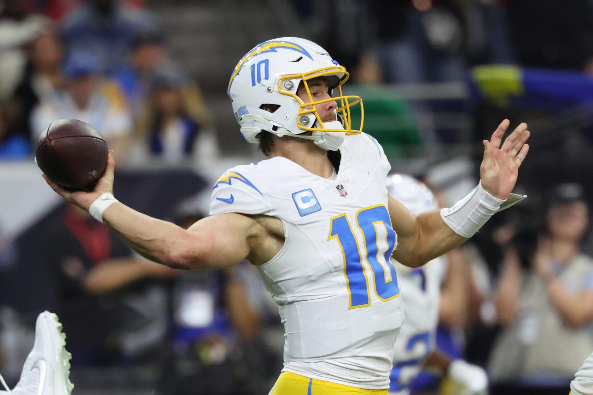 Los Angeles Chargers quarterback Justin Herbert (10) looks to pass during the second quarter against the Houston Texans in an AFC wild card game at NRG Stadium.