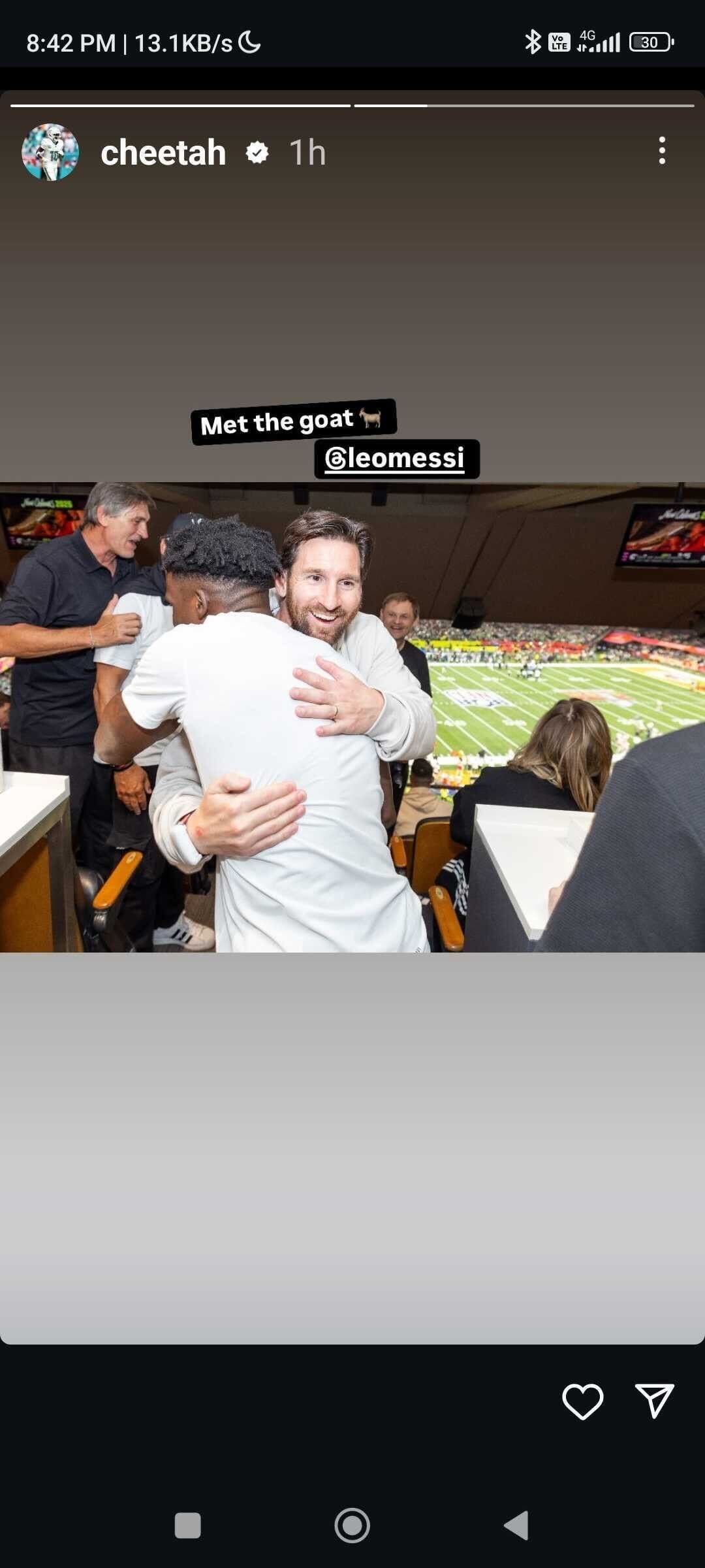 Tyreek Hill and Lionel Messi embrace at Super Bowl 59. 