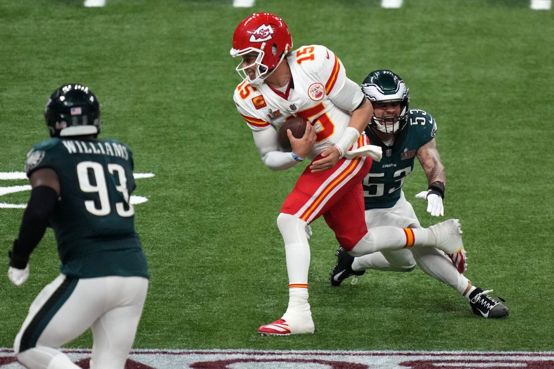 Philadelphia Eagles linebacker Zack Baun (53) makes a tackle on Kansas City Chiefs quarterback Patrick Mahomes (15) during the fourth quarter in Super Bowl LIX at Caesars Superdome.