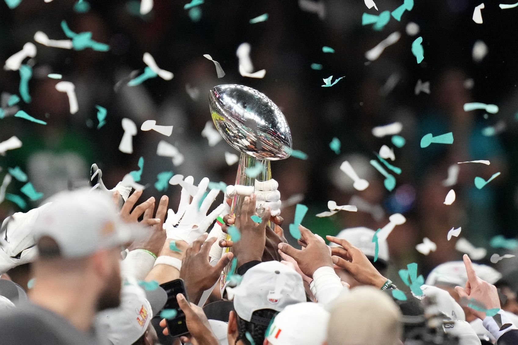 The Philadelphia Eagles hoist the Vince Lombardi Trophy after defeating the Kansas City Chiefs in Super Bowl LIX at Ceasars Superdome.