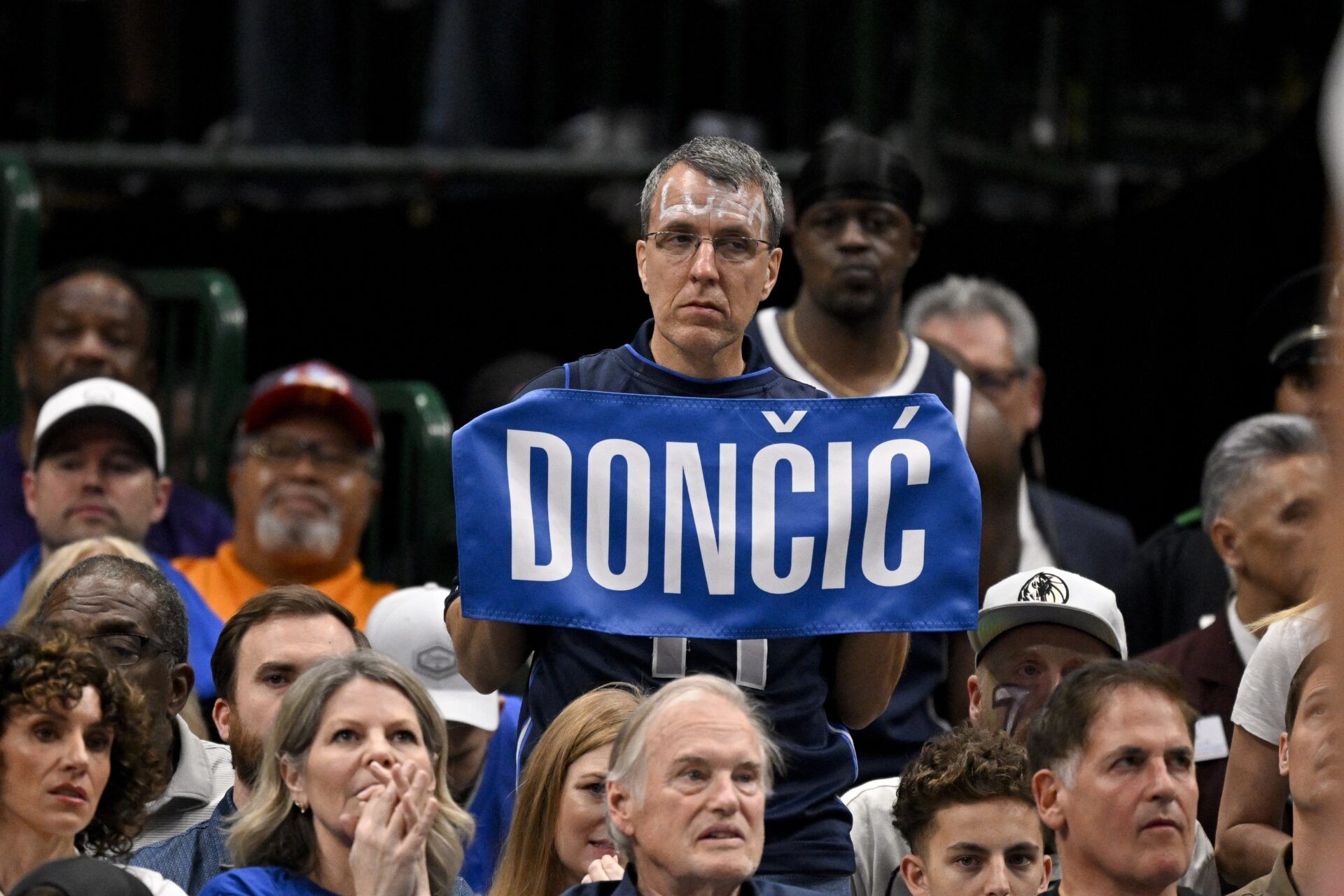 A fan holds up a sign for former Mavericks point guard Luka Doncic during the second half of the game between Dallas and the Houston Rockets at the American Airlines Center.