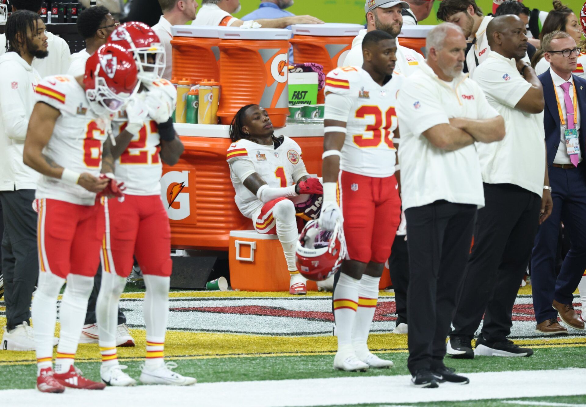Kansas City Chiefs players including Kansas City Chiefs wide receiver Xavier Worthy (1) react from the sideline in the fourth quarter against the Philadelphia Eagles in Super Bowl LIX at Ceasars Superdome.
