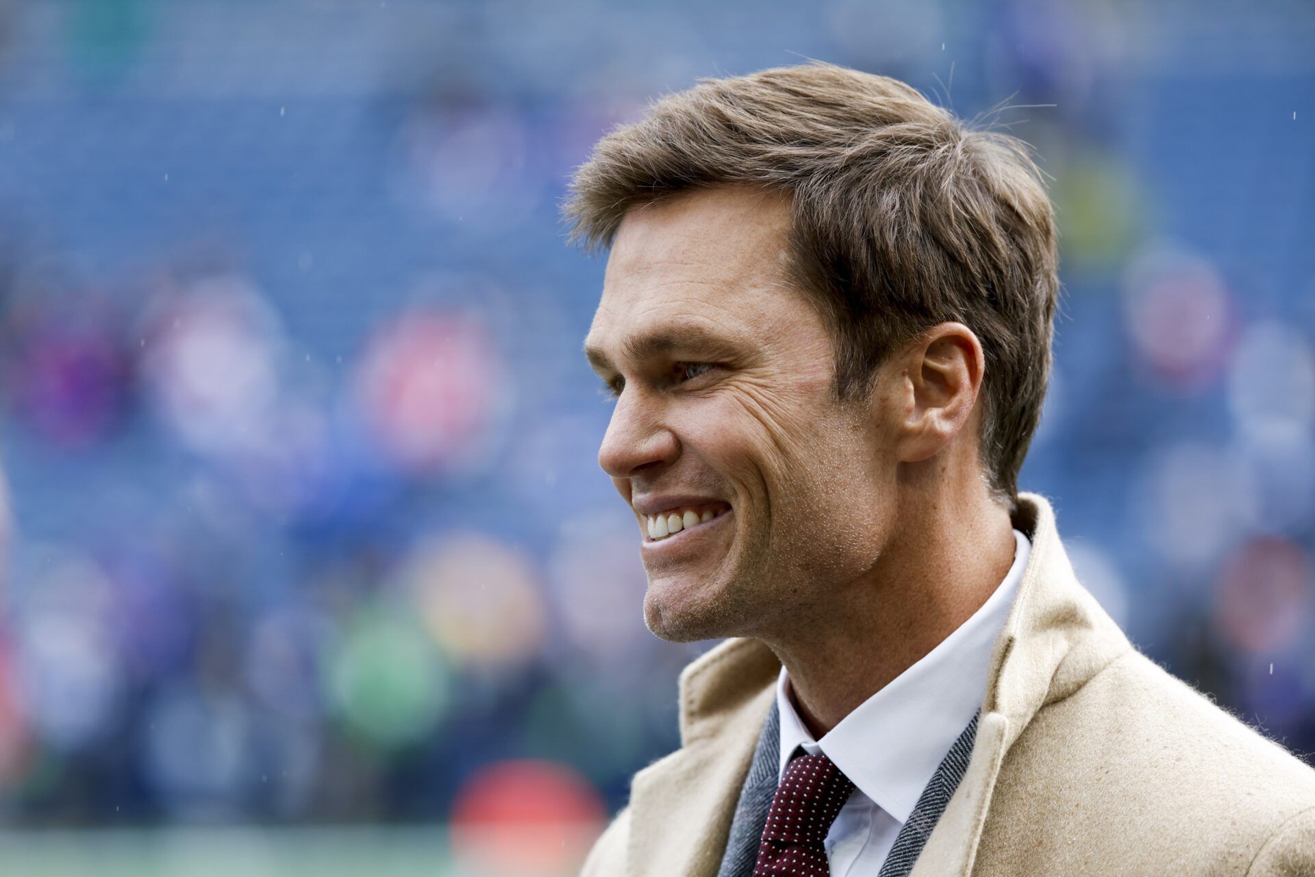 FOX commentator Tom Brady stands on the sideline before a game between the Seattle Seahawks and Buffalo Bills at Lumen Field.