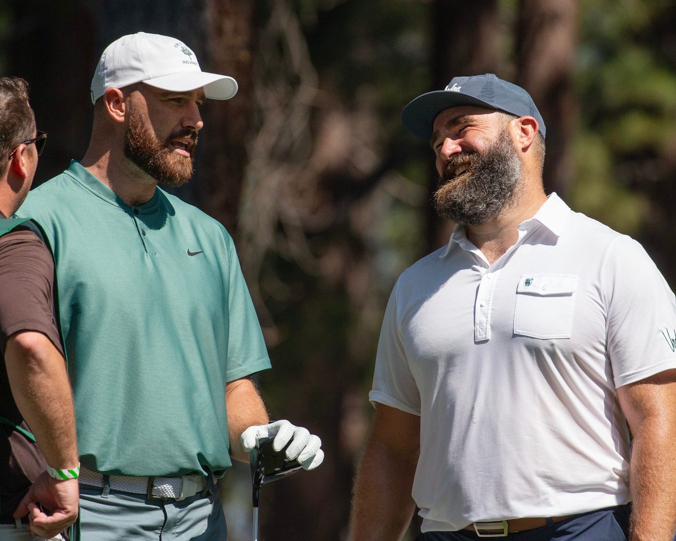 Travis Kelce and brother Jason Kelce talk on the 4th tee during the first round of the American Century Celebrity Championship golf tournament at Edgewood Tahoe Golf Course