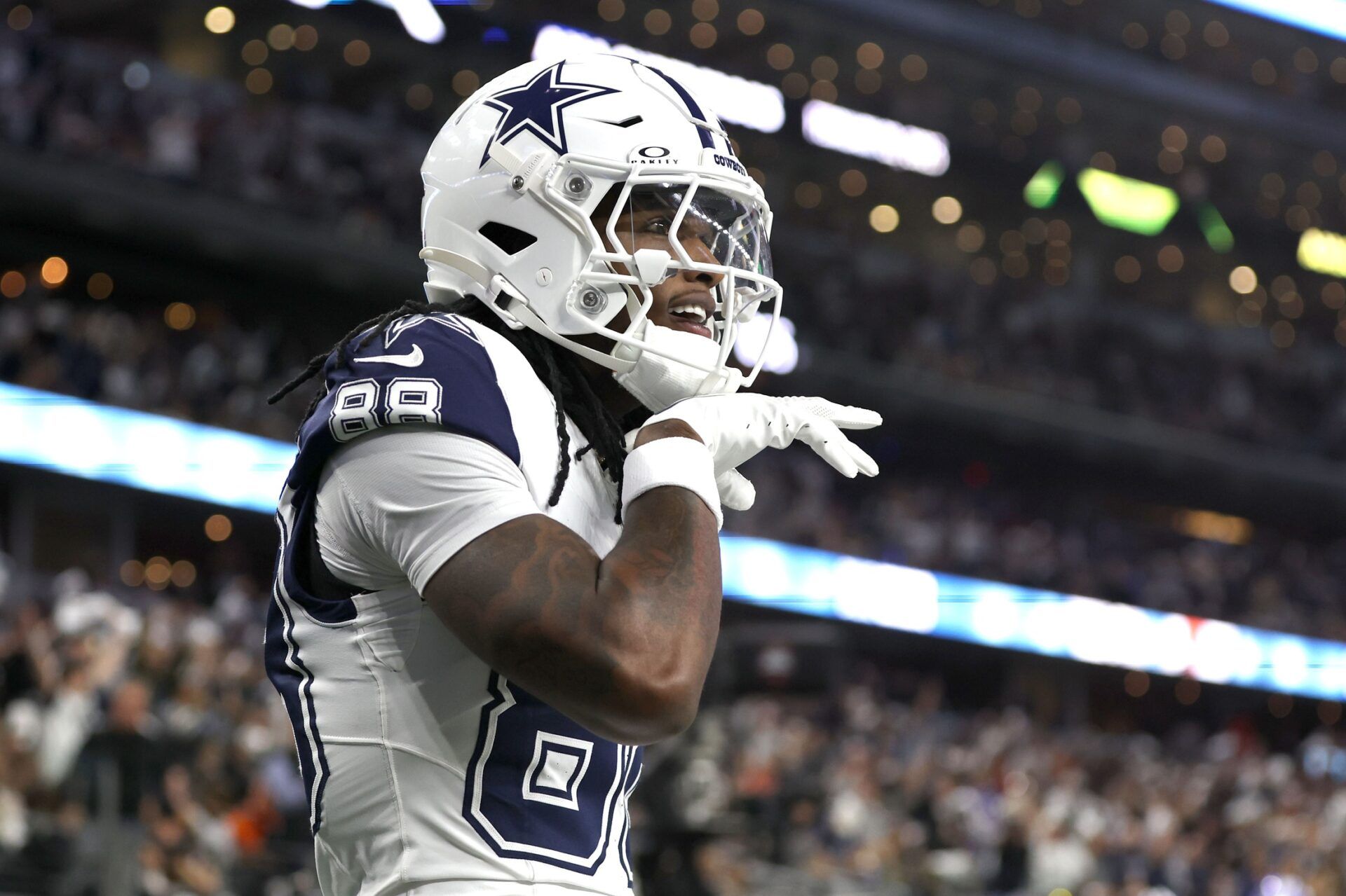 Dallas Cowboys wide receiver CeeDee Lamb (88) reacts after scoring a touchdown against the Cincinnati Bengals in the first quarter at AT&T Stadium.