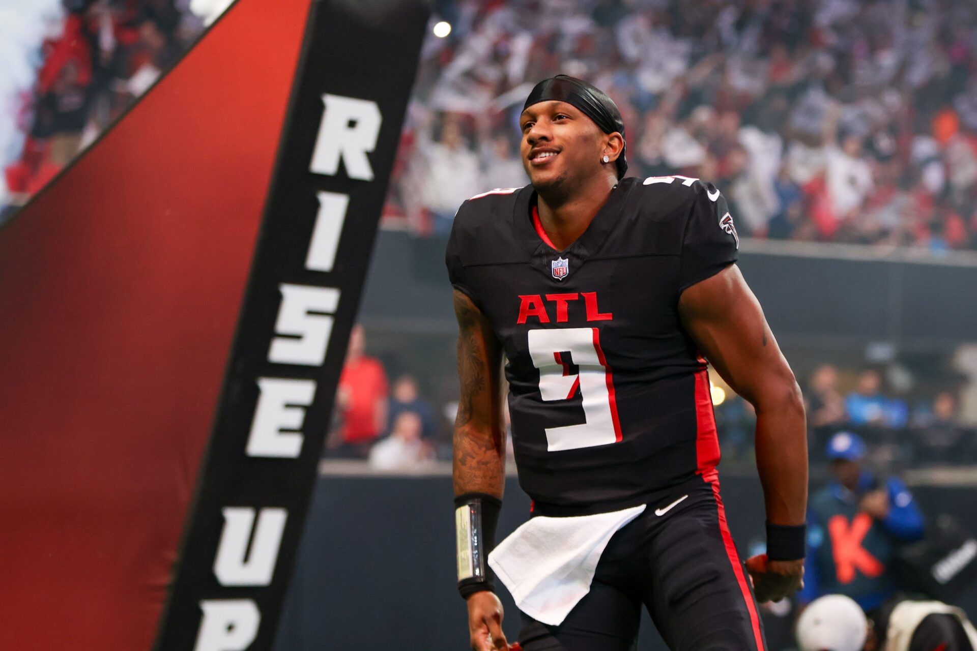 Atlanta Falcons quarterback Michael Penix Jr. (9) is introduced before a game against the Carolina Panthers at Mercedes-Benz Stadium.