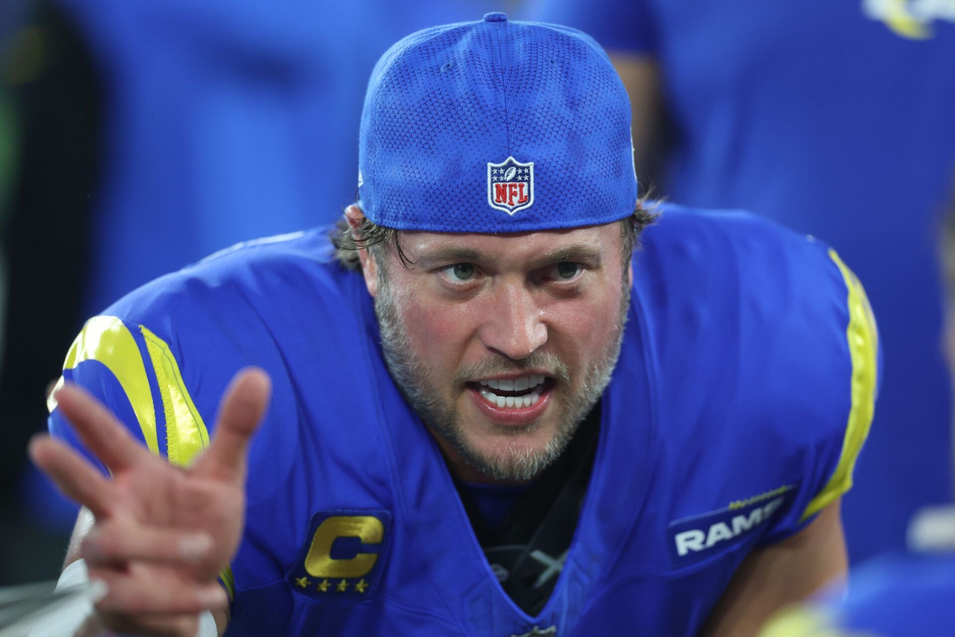 Los Angeles Rams quarterback Matthew Stafford (9) reacts during the first half in an NFC wild card game at State Farm Stadium.