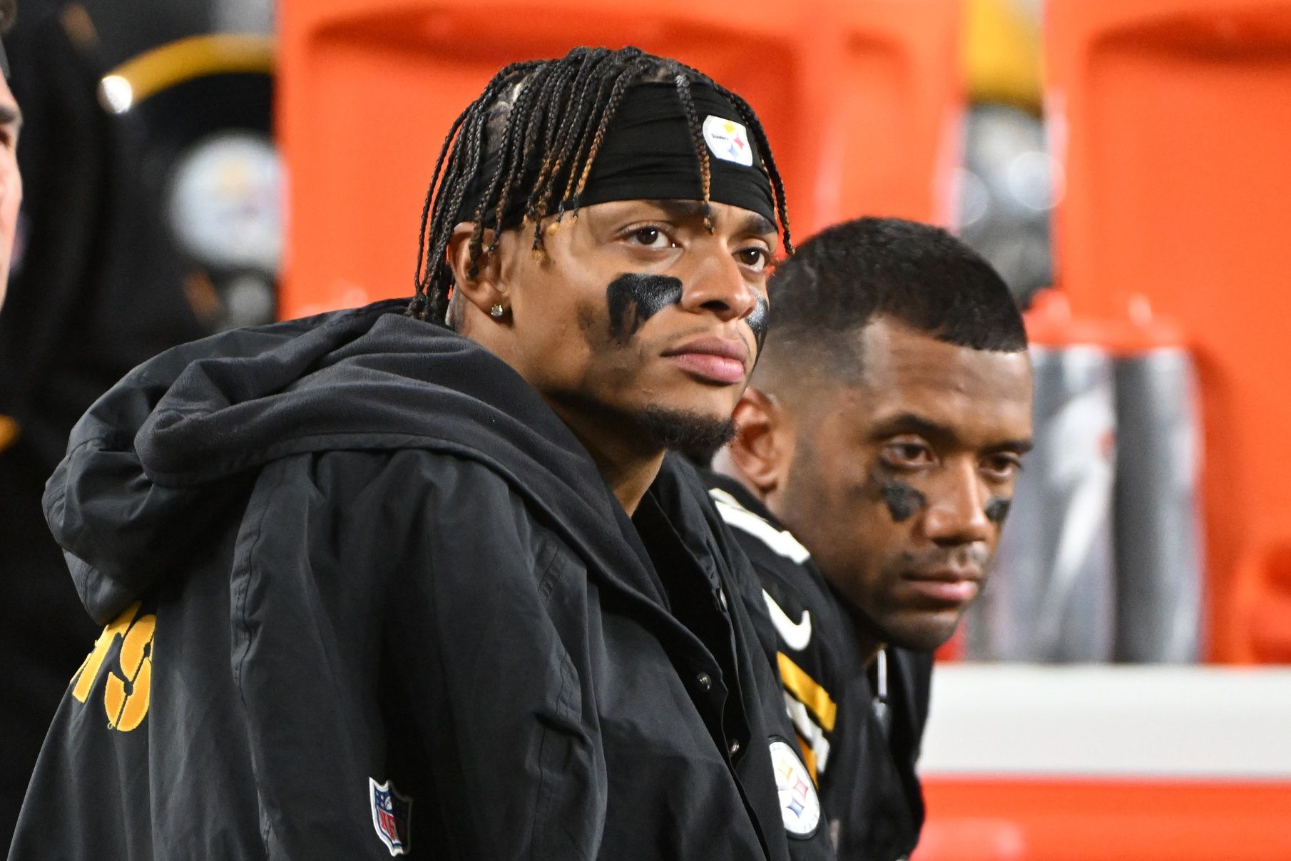 Pittsburgh Steelers quarterbacks Justin Fields (2) and Russell Wilson (3) watch the action against the New York Jets during the fourth quarter at Acrisure Stadium.