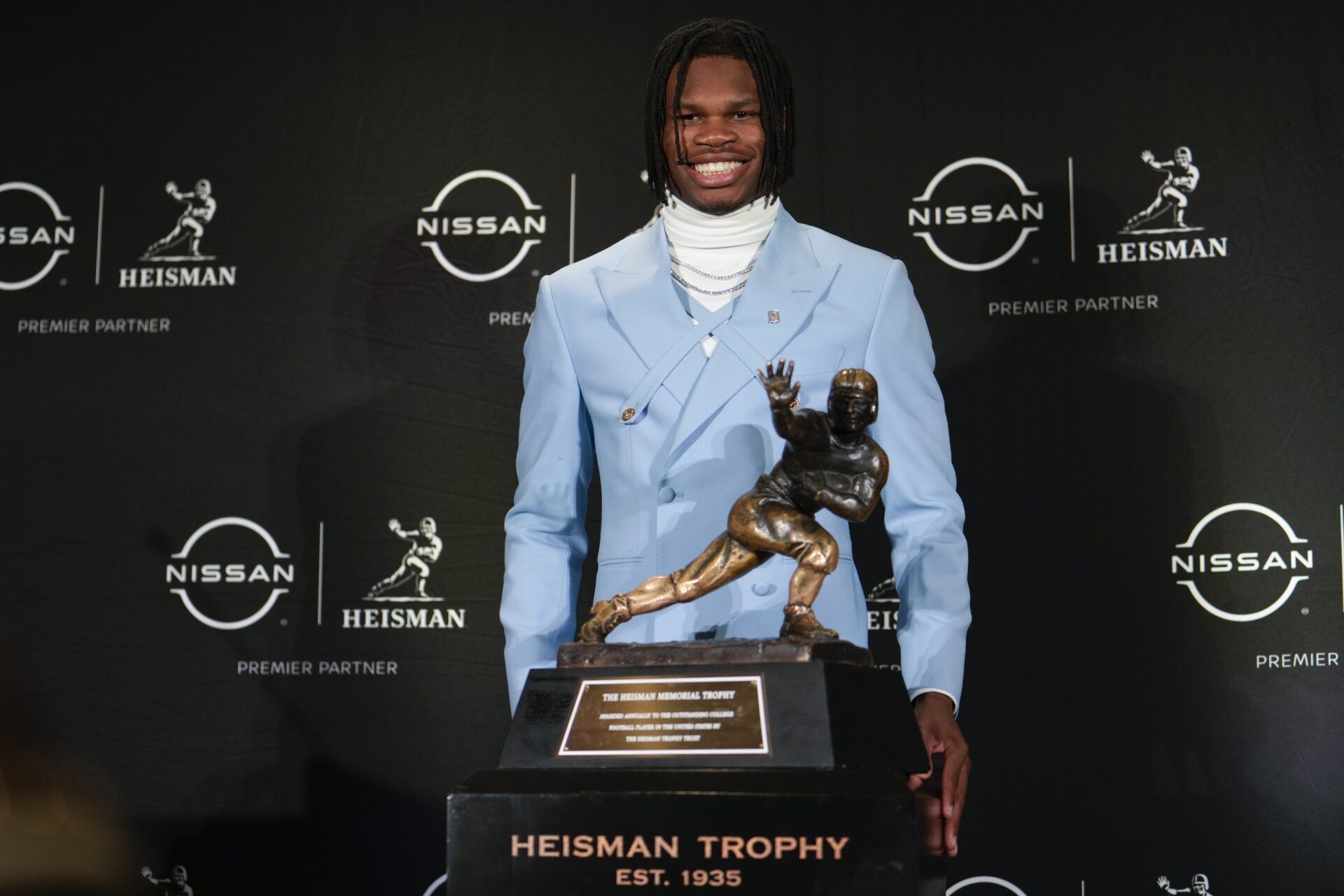 Colorado Buffaloes wide receiver/cornerback Travis Hunter poses for a photo during a press conference before the 2024 Heisman Trophy Presentation.