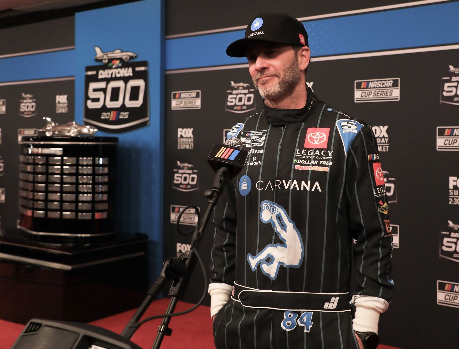 Jimmie Johnson talks with the press during his first NASCAR red carpet during media day on Wednesday, Feb.12, 2025.