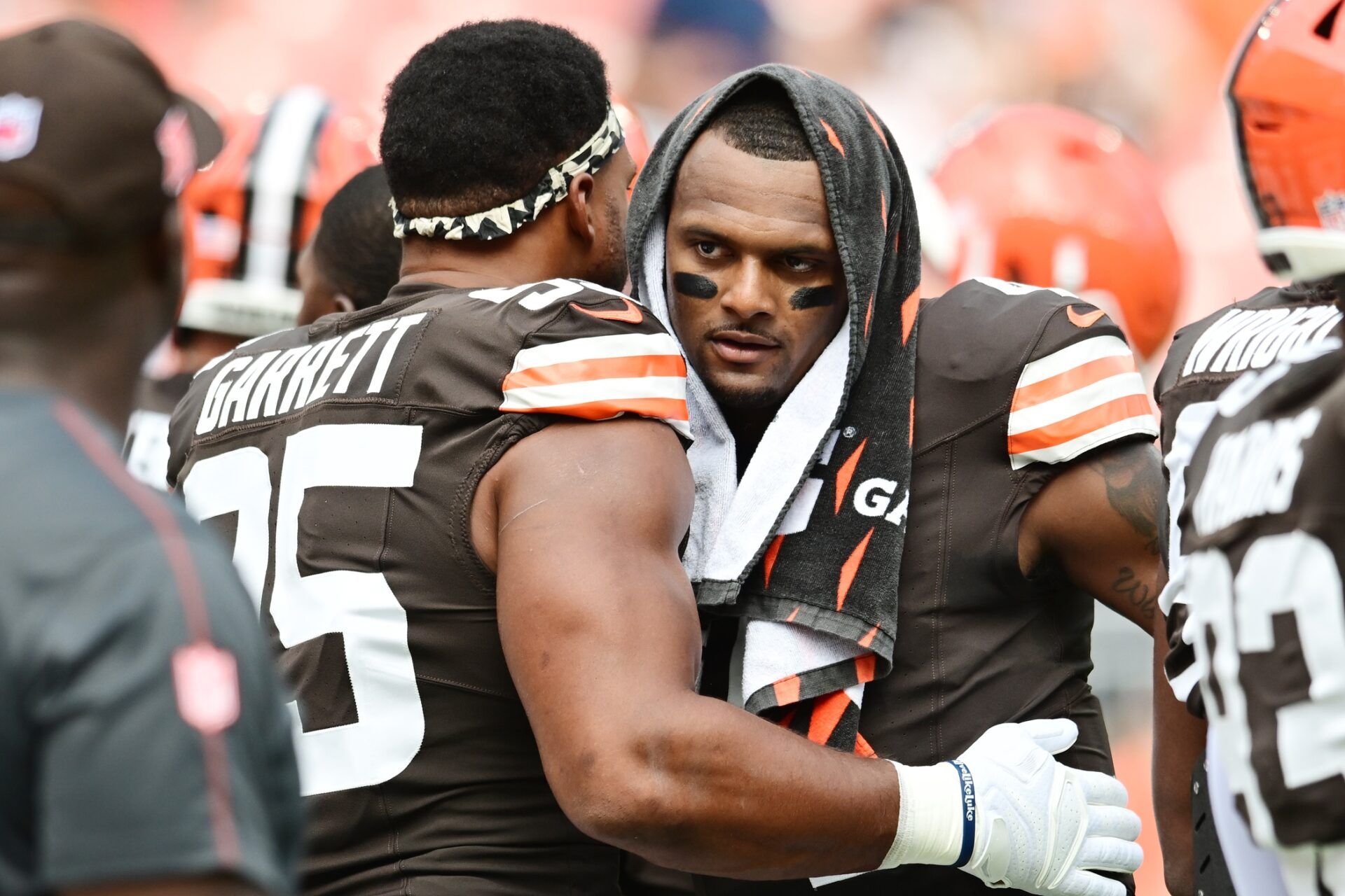 Cleveland Browns defensive end Myles Garrett (95) and quarterback Deshaun Watson (4) hug before the game between the Browns and the New York Giants at Huntington Bank Field.