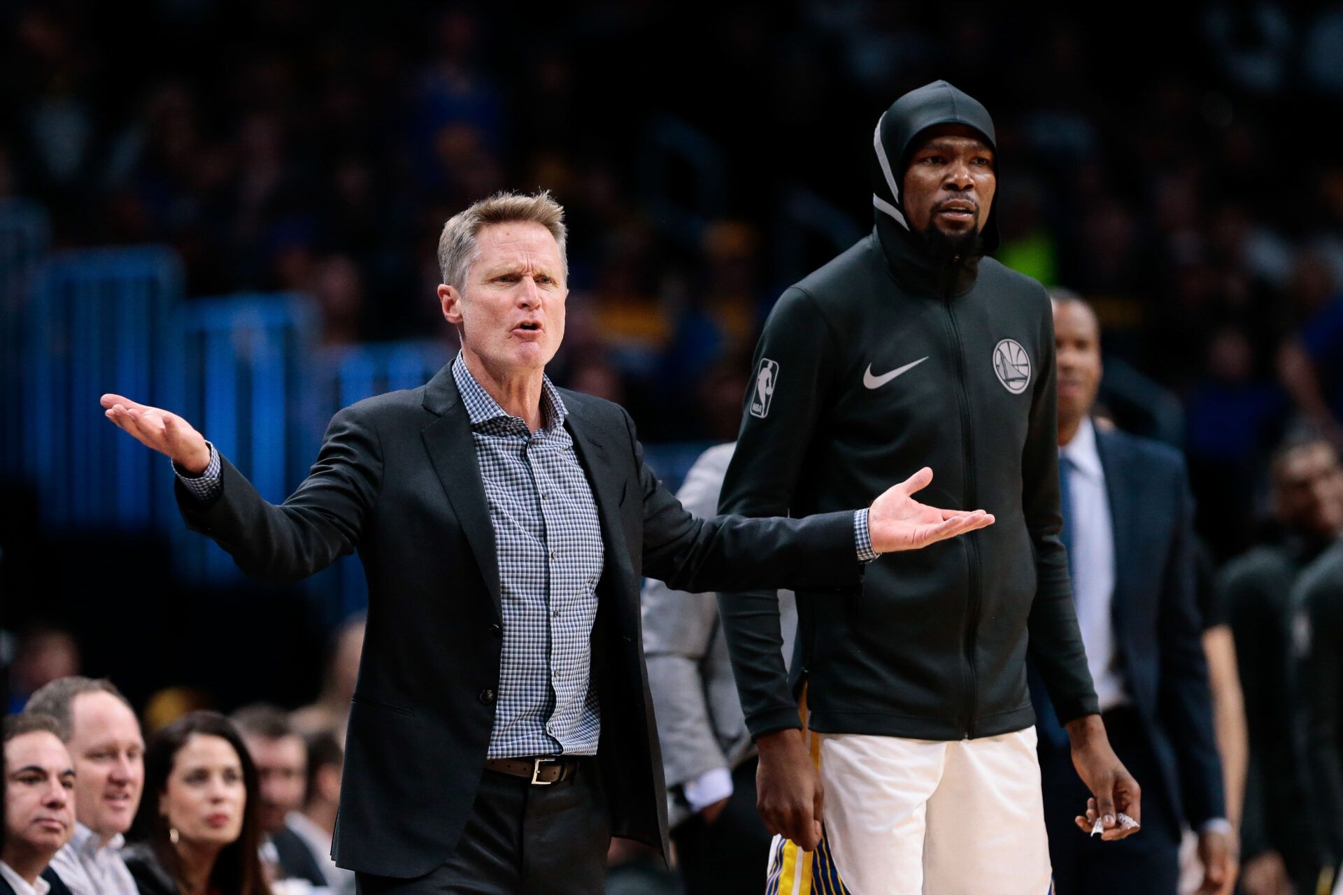 Feb 3, 2018; Denver, CO, USA; Golden State Warriors head coach Steve Kerr reacts after receiving a technical foul as forward Kevin Durant (35) looks on in the first quarter against the Denver Nuggets at the Pepsi Center. Mandatory Credit: Isaiah J. Downing-USA TODAY Sports