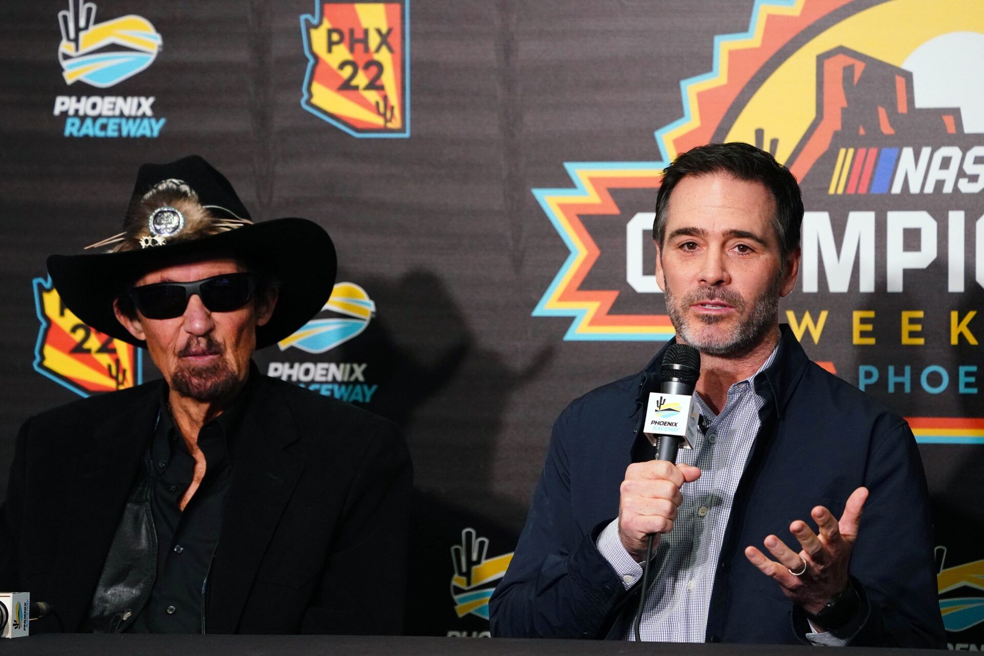 Jimmie Johnson talks with the media during a press conference at Phoenix Raceway. Jimmie Johnson finalized an ownership stake within the Petty GMS organization starting in 2023, and Johnson will also drive in select races for the team starting at the Daytona 500.