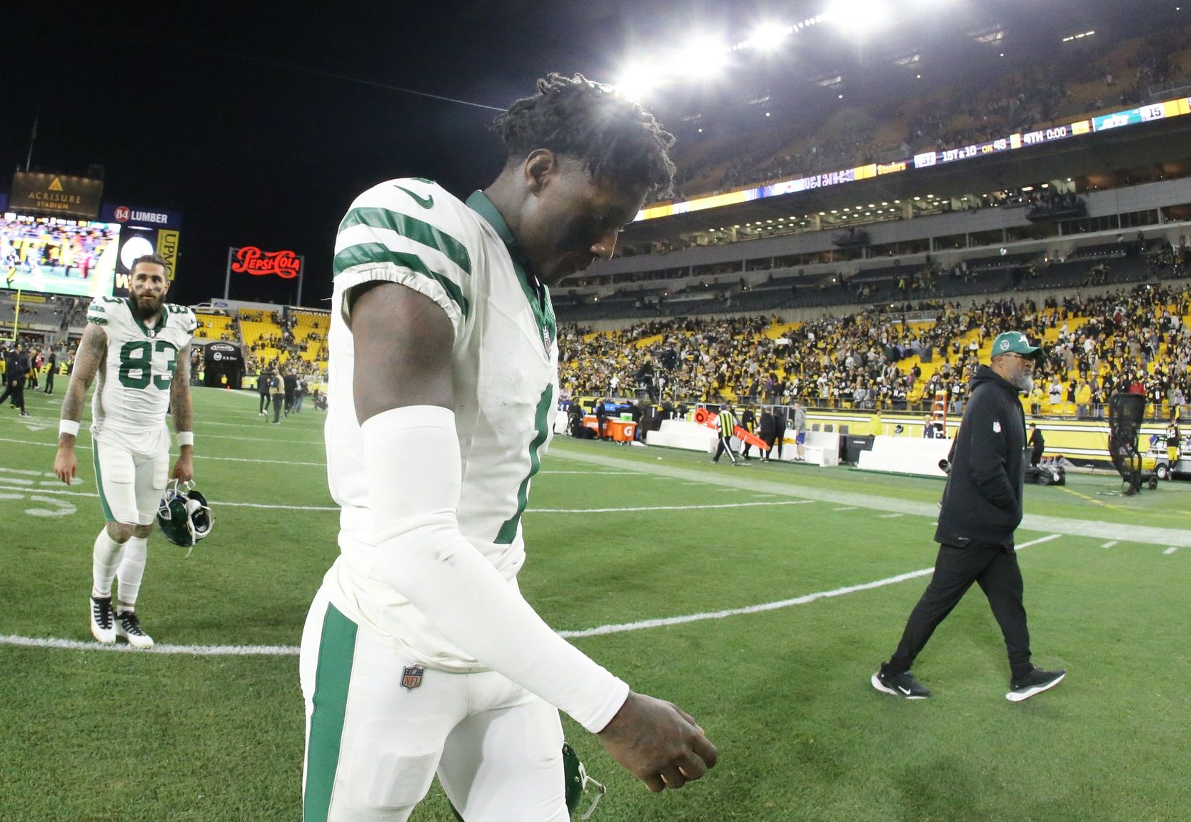 New York Jets cornerback Sauce Gardner (1) reacts as he leaves the field after playing the Pittsburgh Steelers at Acrisure Stadium.