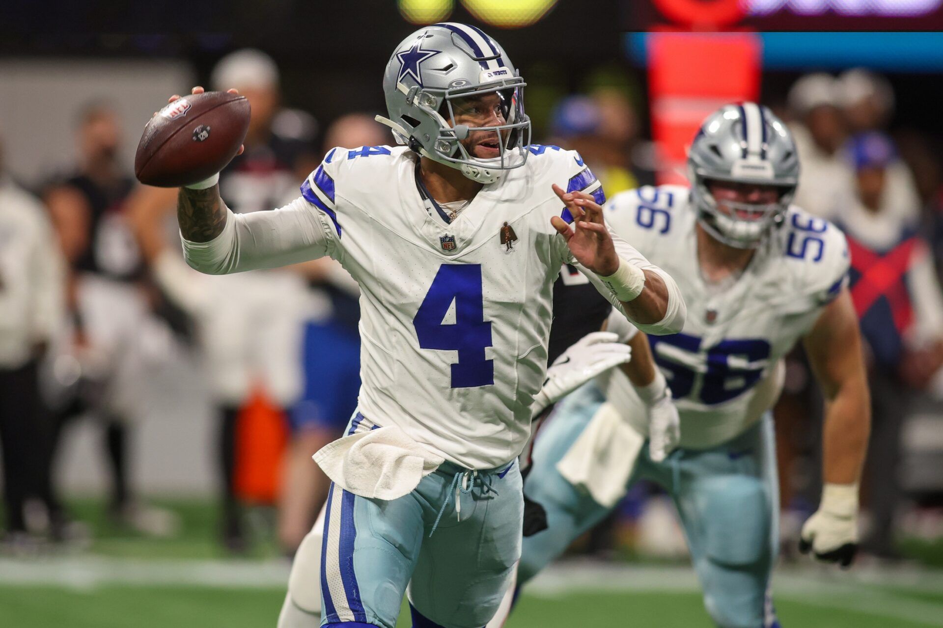 Dallas Cowboys quarterback Dak Prescott (4) throws a pass against the Atlanta Falcons in the third quarter at Mercedes-Benz Stadium.