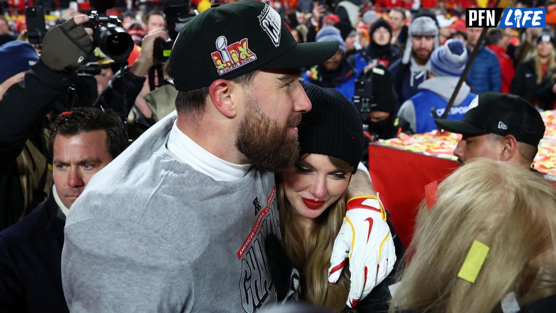 Recording artist Taylor Swift and Kansas City Chiefs tight end Travis Kelce (87) react after the AFC Championship game against the Buffalo Bills at GEHA Field at Arrowhead Stadium.