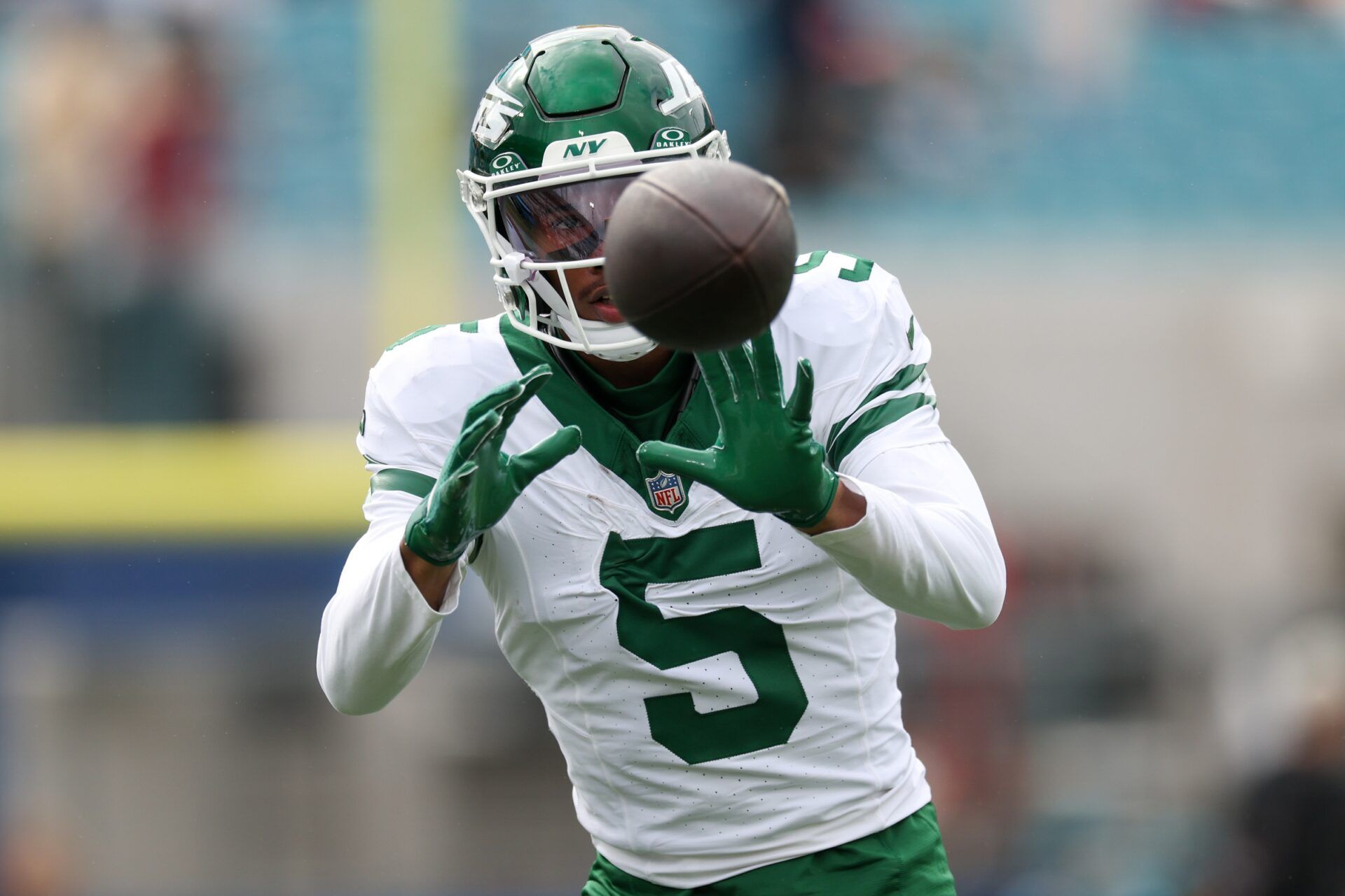 New York Jets wide receiver Garrett Wilson (5) warms up before a game against the Jacksonville Jaguars at EverBank Stadium.