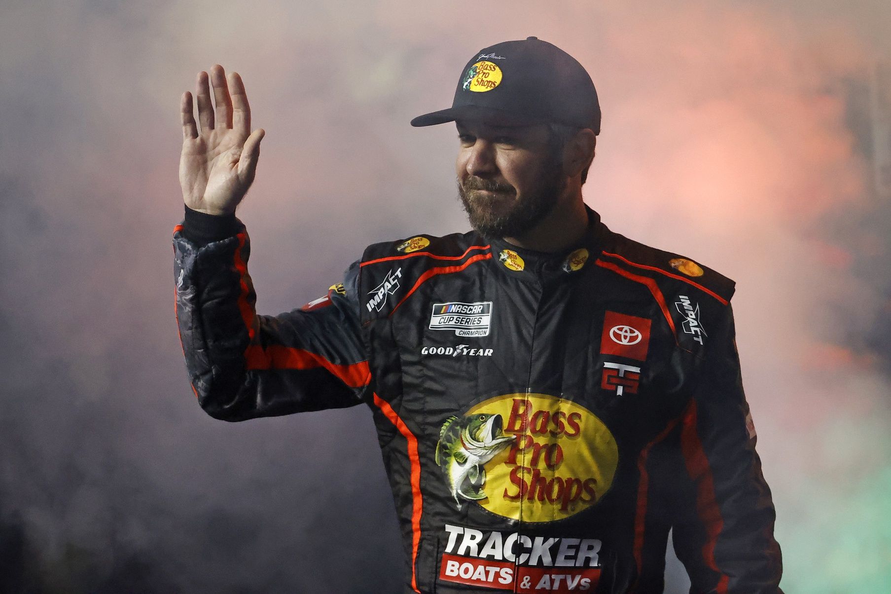 Feb 13, 2025; Daytona Beach, Florida, USA; NASCAR Cup Series driver Martin Truex Jr. (56) during driver introductions for the Duels at Daytona International Speedway. Mandatory Credit: Peter Casey-Imagn Images