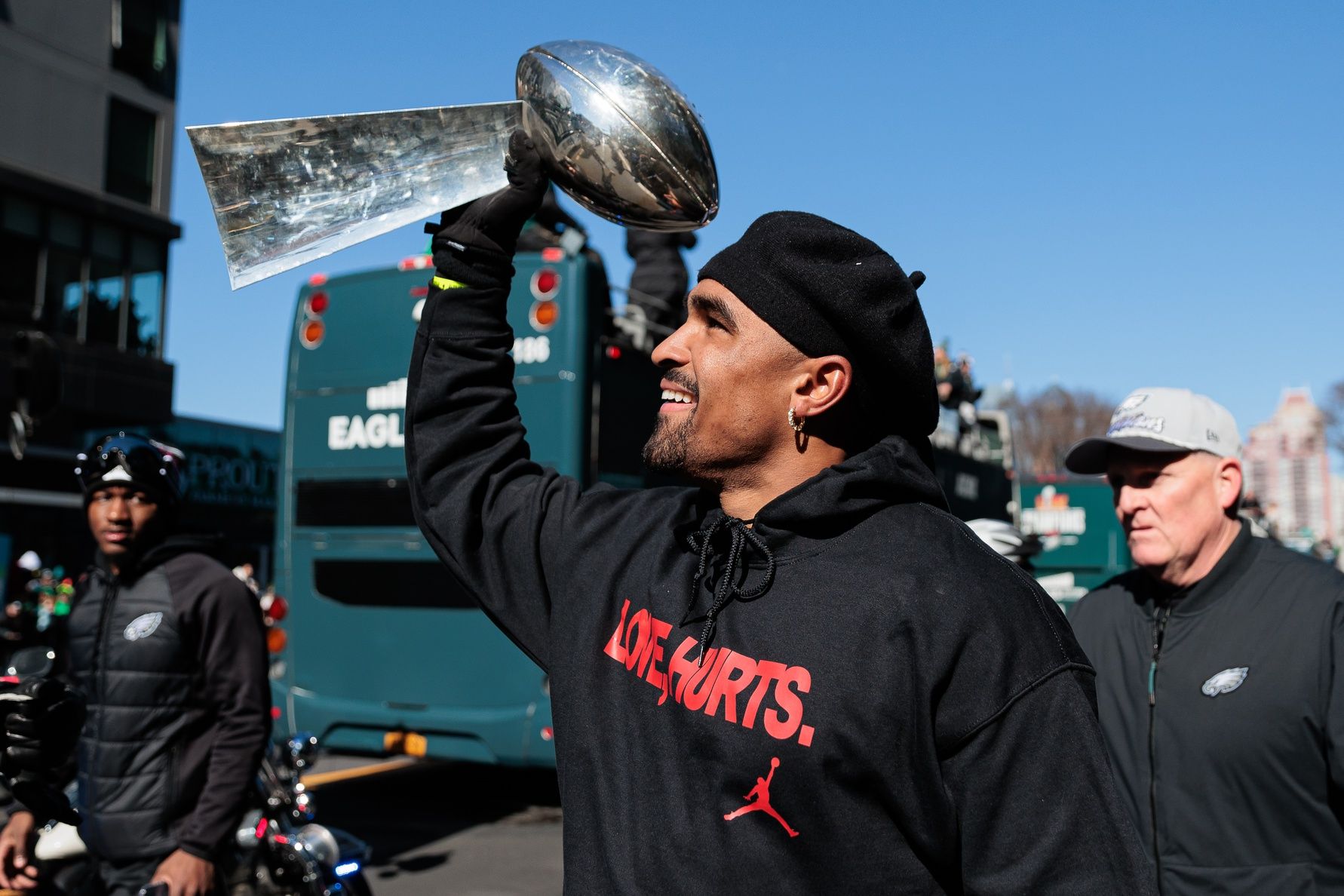 Philadelphia Eagles quarterback Jalen Hurts (1) celebrates with the Lombardi Trophy during the Super Bowl LIX championship parade and rally.