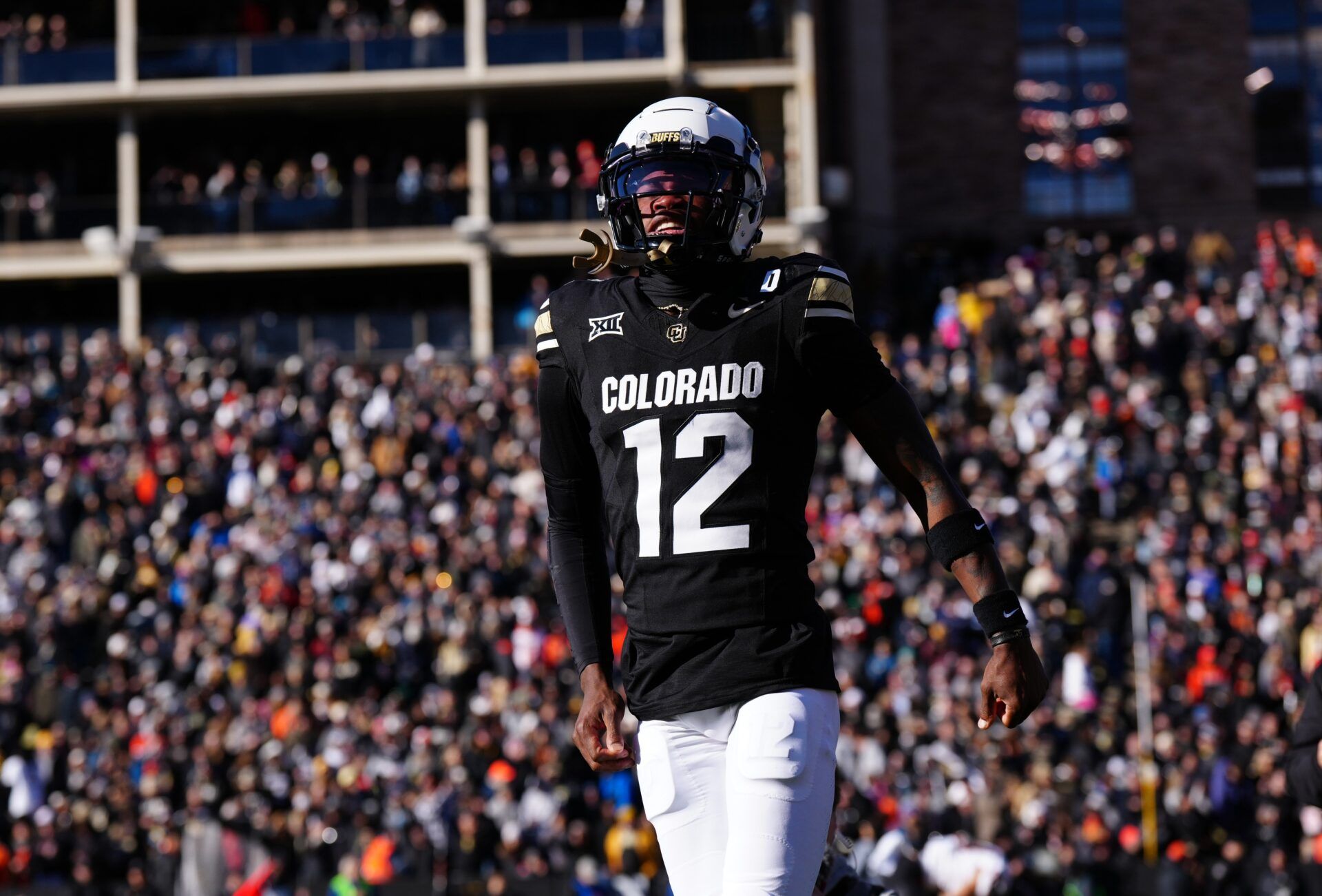 Colorado Buffaloes wide receiver Travis Hunter (12) reacts in the first quarter against the Oklahoma State Cowboys at Folsom Field.